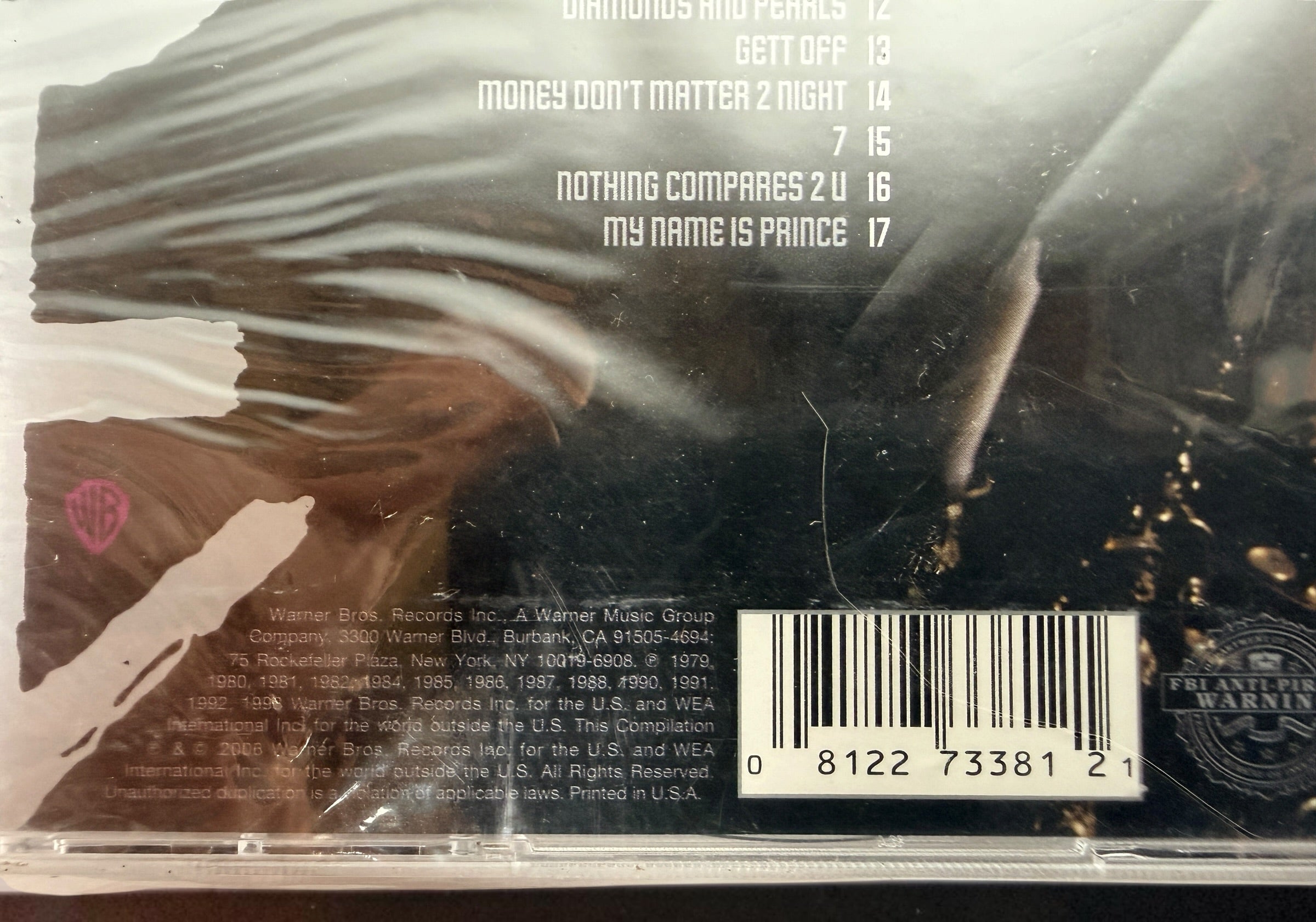 Factory-sealed Prince&nbsp;Ultimate 2CD compilation featuring Purple Rain, 1999, Kiss, and bonus remixes. Original hype sticker and jewel case included.