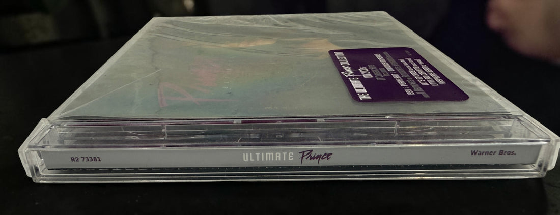 Factory-sealed Prince&nbsp;Ultimate 2CD compilation featuring Purple Rain, 1999, Kiss, and bonus remixes. Original hype sticker and jewel case included.