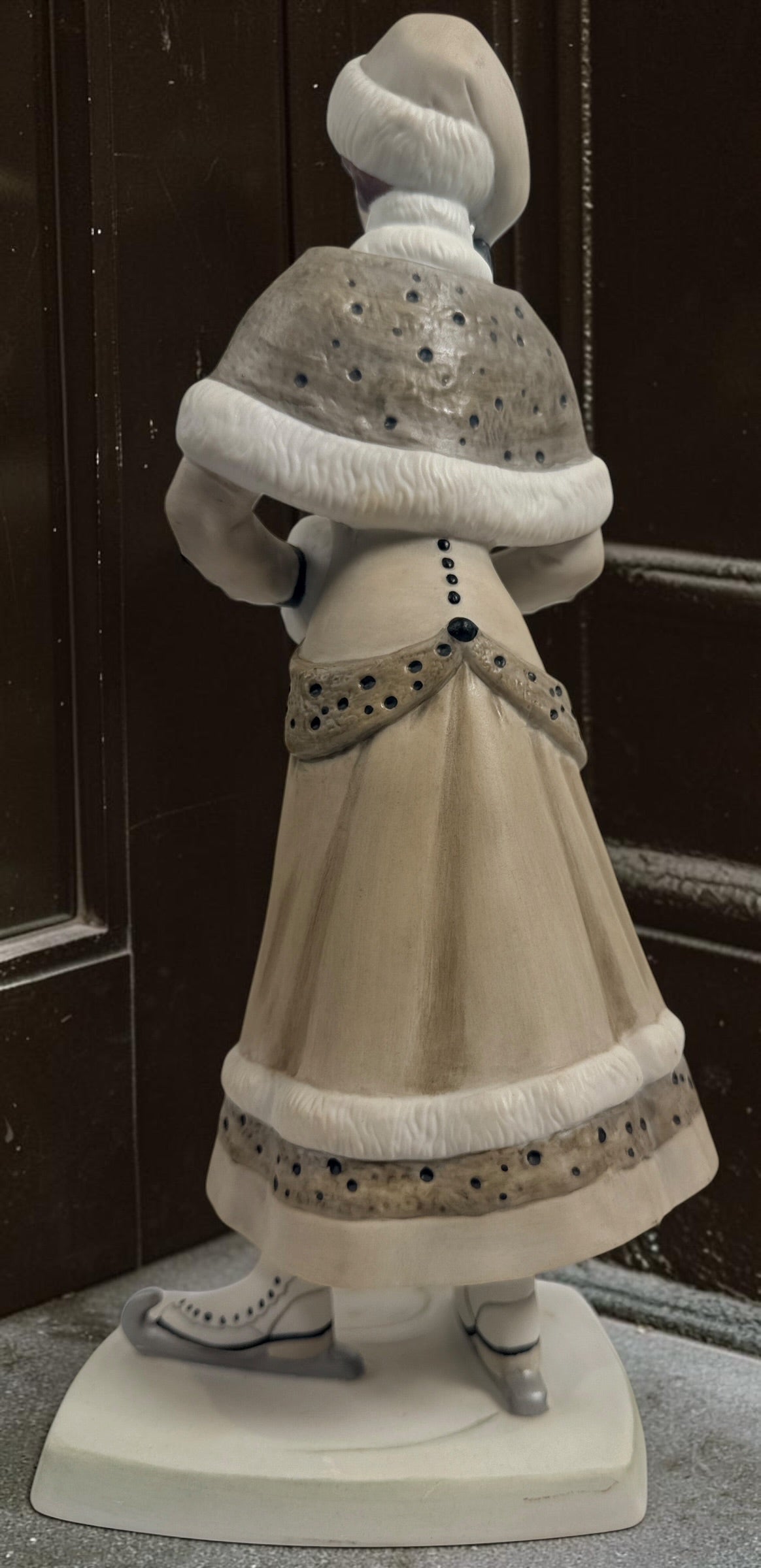 Exclusive Avon Canada 100th anniversary Mrs. P.F.E. Albee figurine award from 2014–2015 featuring a winter skating theme and original commemorative inscription.