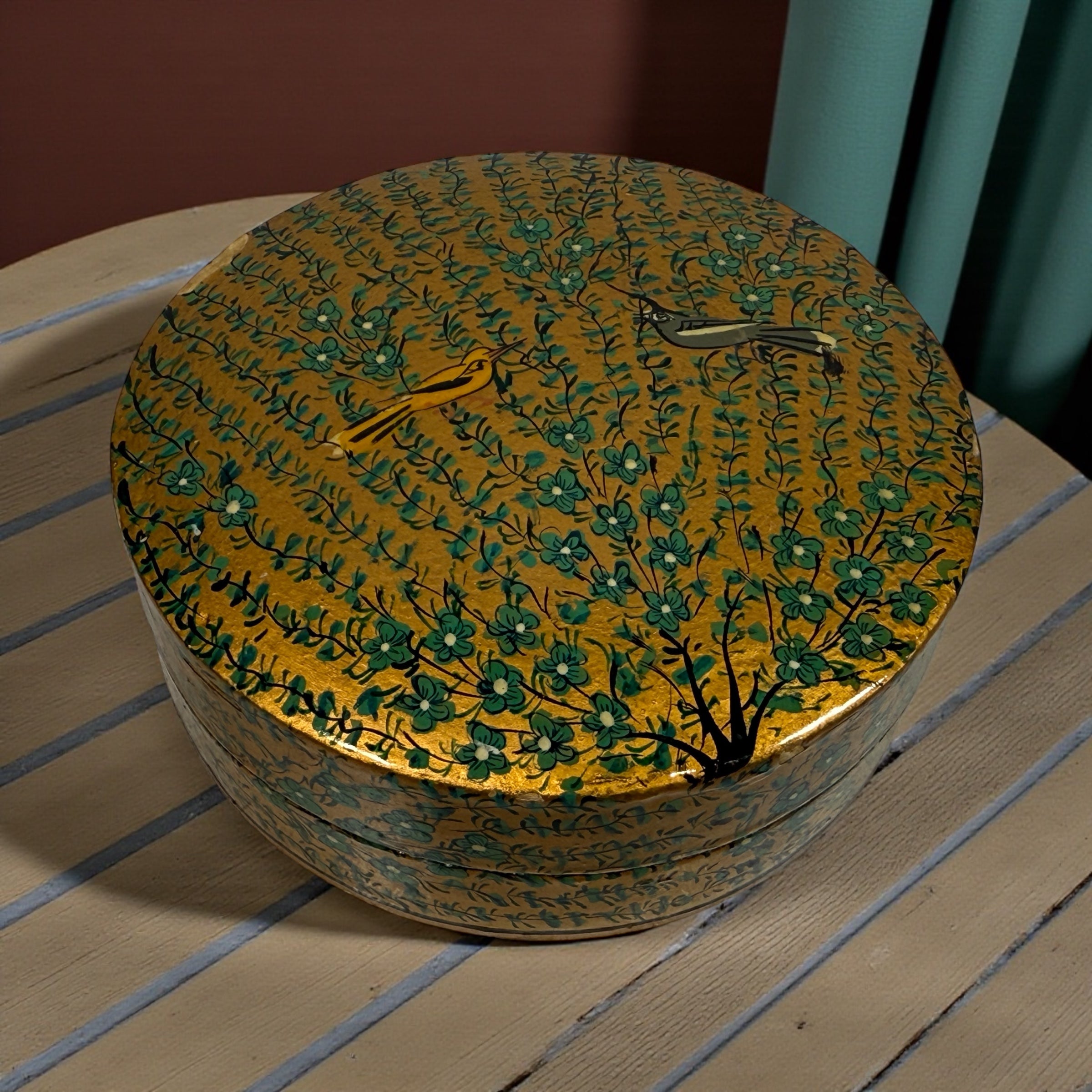 Vintage Kashmiri papier-mâché box with six matching coasters, hand-painted floral and bird design, traditional Indian folk art decor.