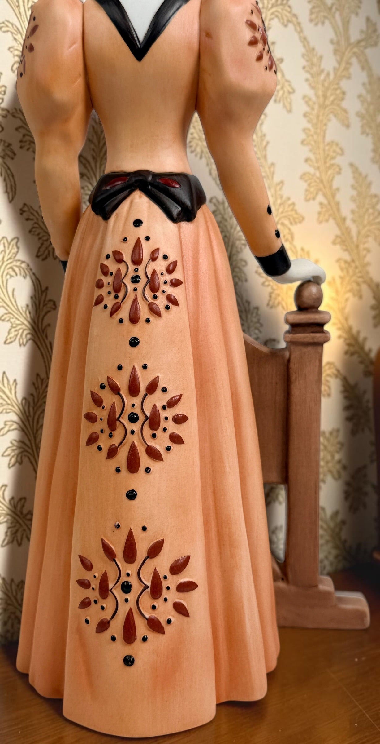 2013–2014 Avon Mrs. P.F.E. Albee award figurine featuring the California Perfume Company sign and Victorian dress. Ceramic collectible in good condition.