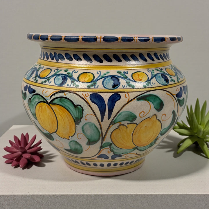 Hand-painted Spanish ceramic planter in blue and yellow majolica style. Vintage decorative cachepot with folk-art charm, ideal for plants or display.