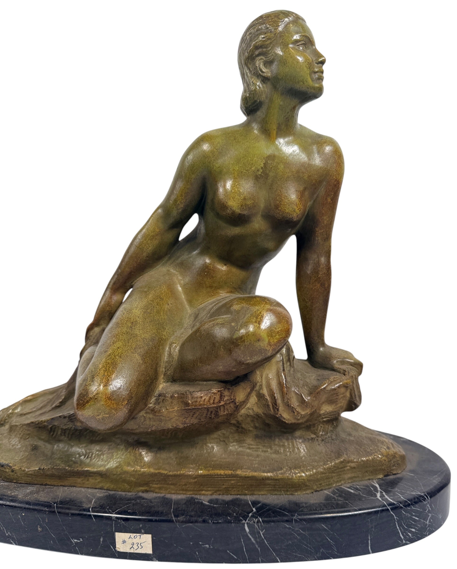 Art Deco seated nude sculpture attributed to Ugo Cipriani, featuring a green-bronze patina and black marble base. Elegant European decorative piece from the 1920s–1930s.