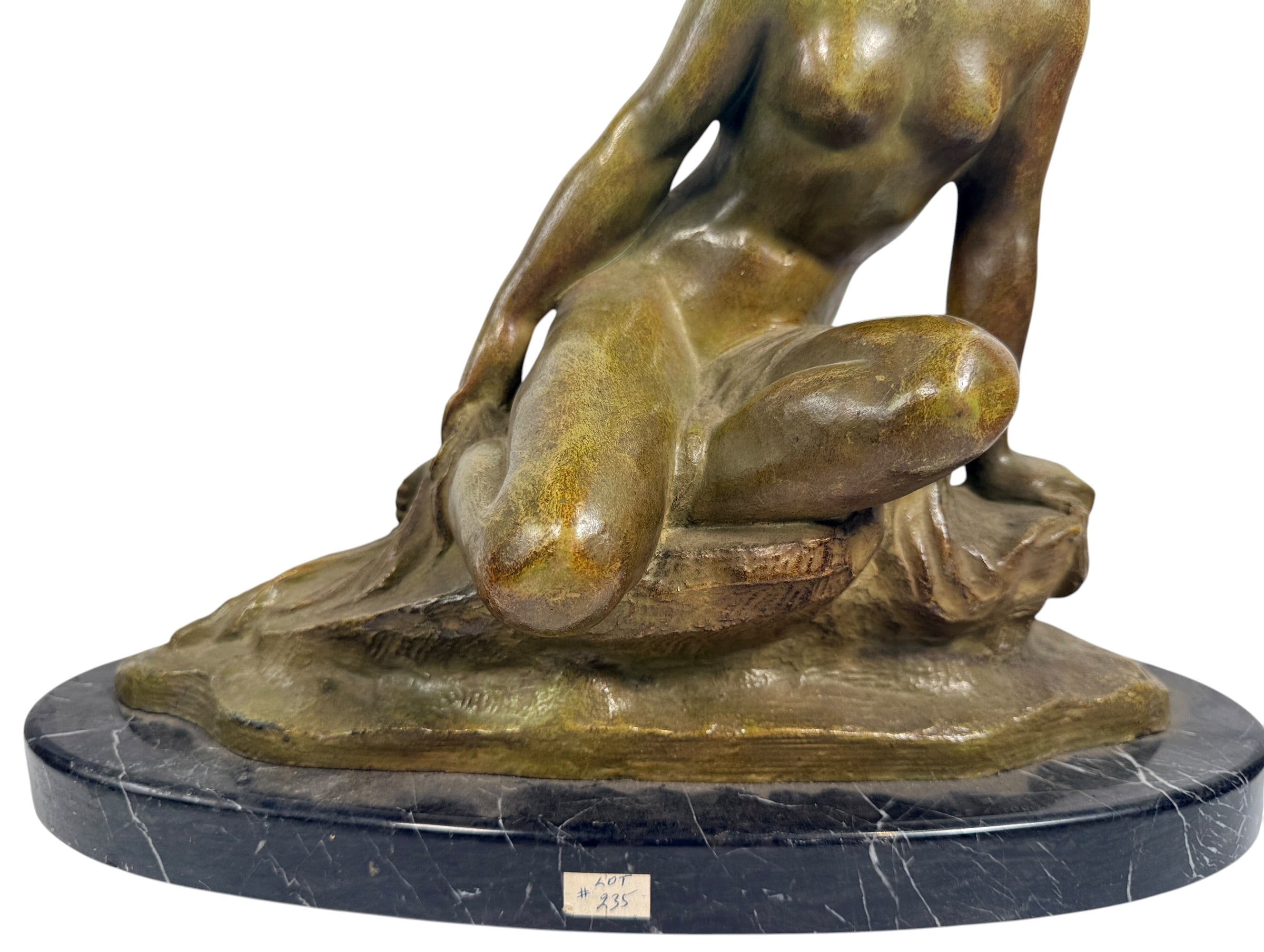 Art Deco seated nude sculpture attributed to Ugo Cipriani, featuring a green-bronze patina and black marble base. Elegant European decorative piece from the 1920s–1930s.