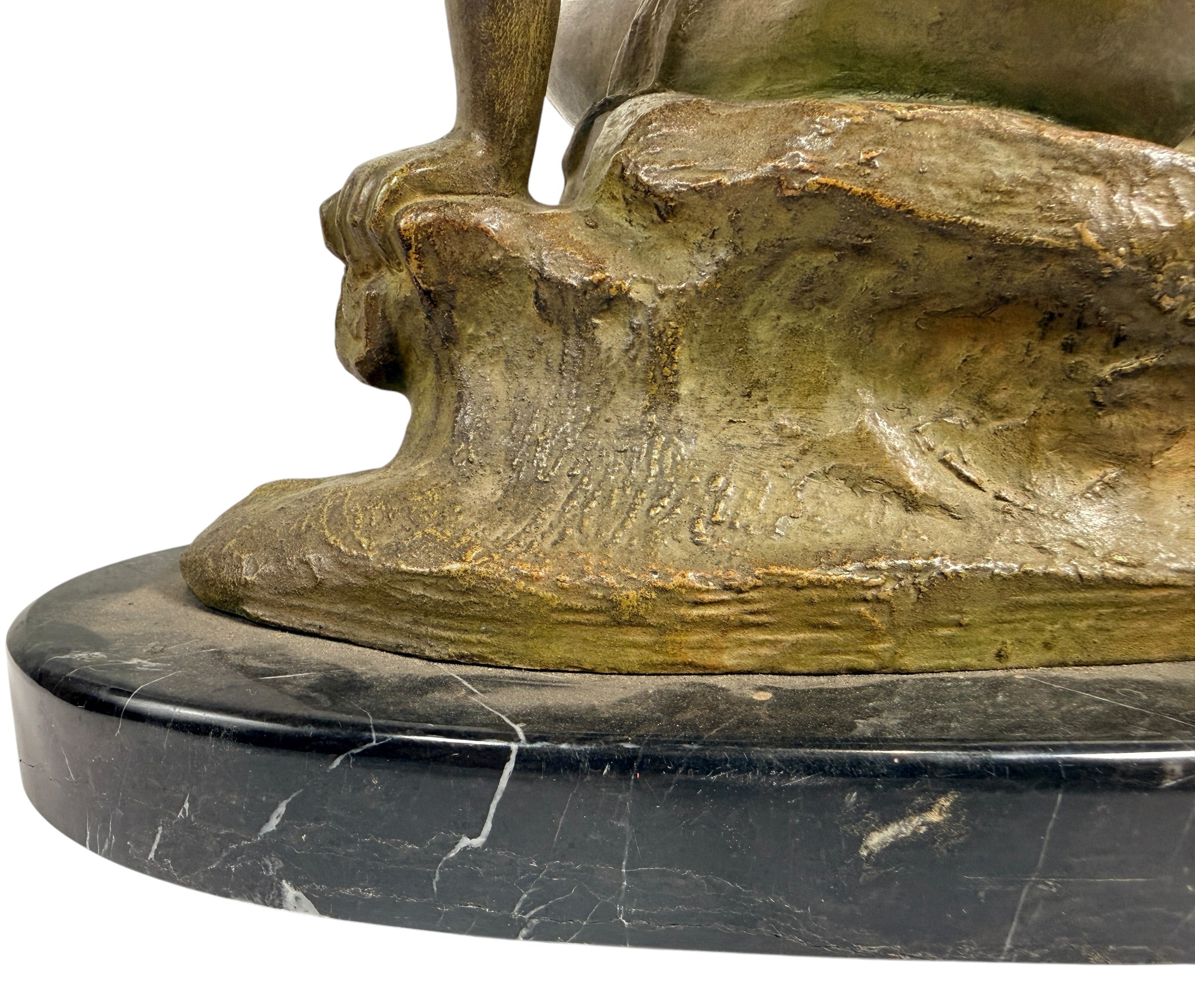 Art Deco seated nude sculpture attributed to Ugo Cipriani, featuring a green-bronze patina and black marble base. Elegant European decorative piece from the 1920s–1930s.