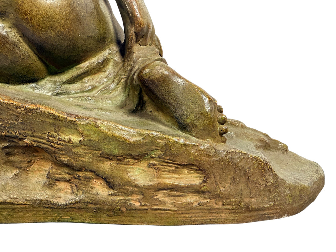 Art Deco seated nude sculpture attributed to Ugo Cipriani, featuring a green-bronze patina and black marble base. Elegant European decorative piece from the 1920s–1930s.