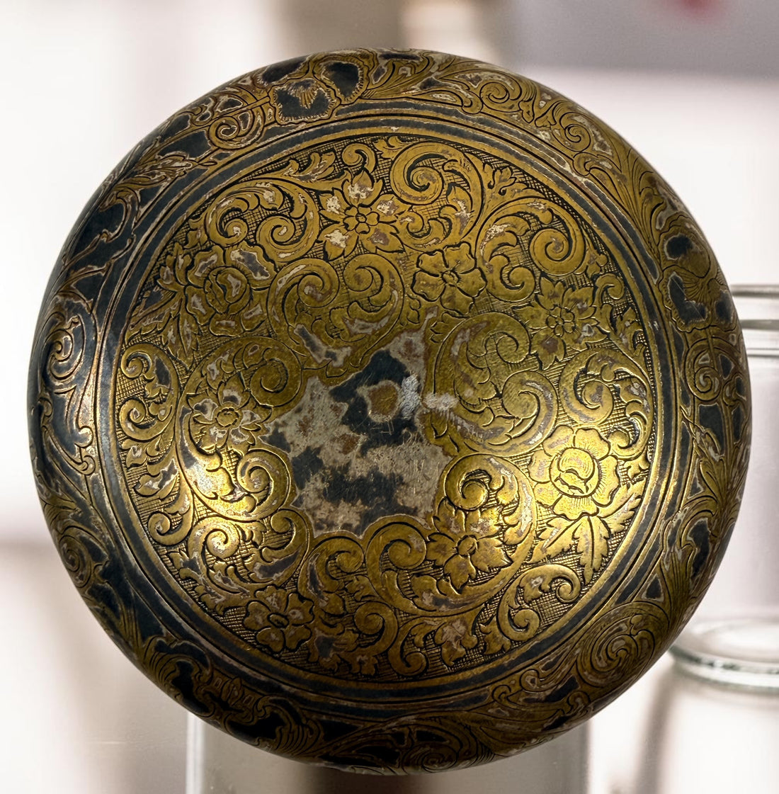 Antique Victorian glass tobacco humidor with ornate German silver overlay, engraved floral motifs, and domed lid. Elegant late-19th-century decorative storage jar.