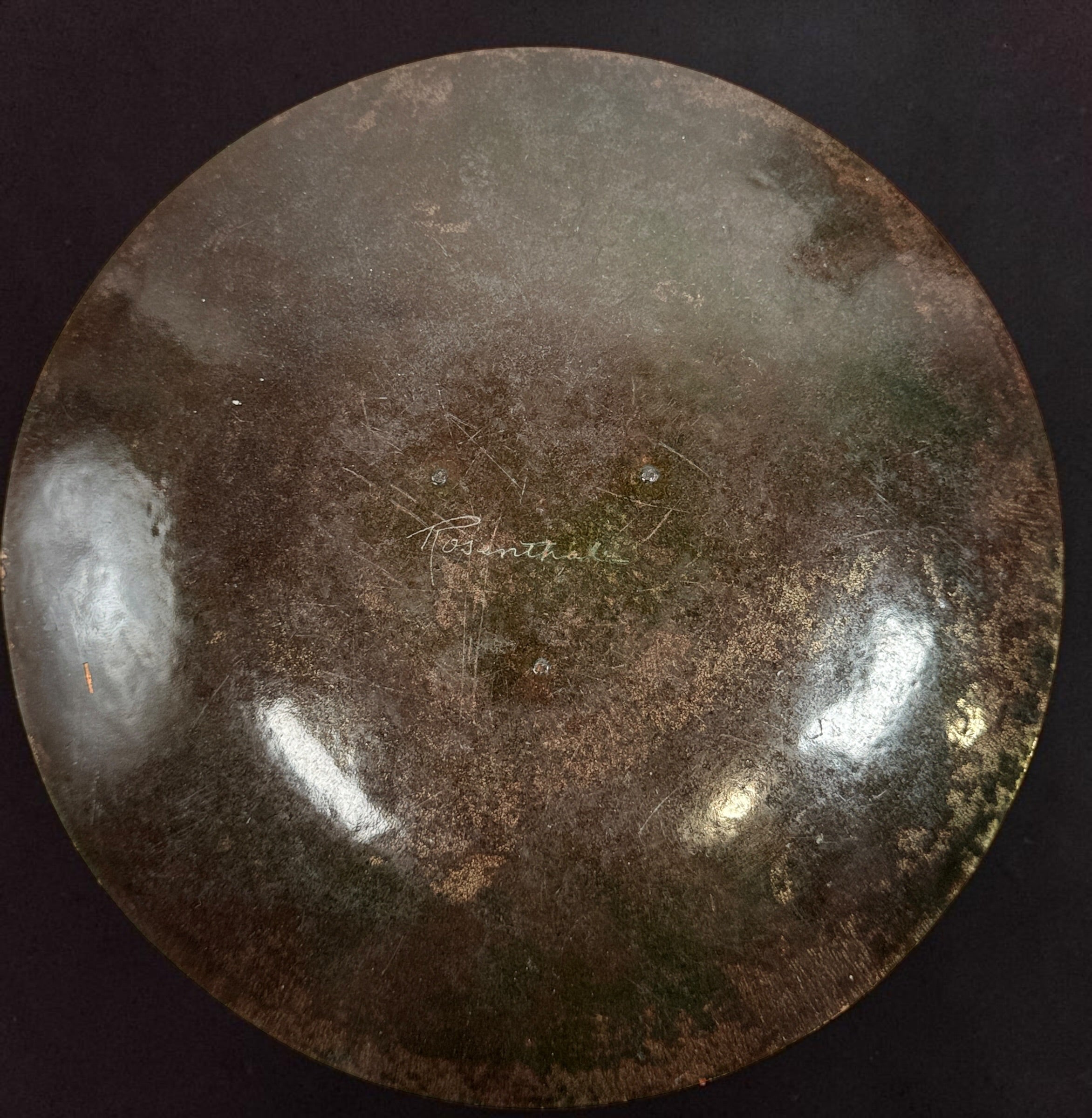 Vintage signed Rosenthal copper charger plate featuring an abstract etched design and rich patina. Mid-century modern studio art piece measuring 8.5 inches in diameter.
