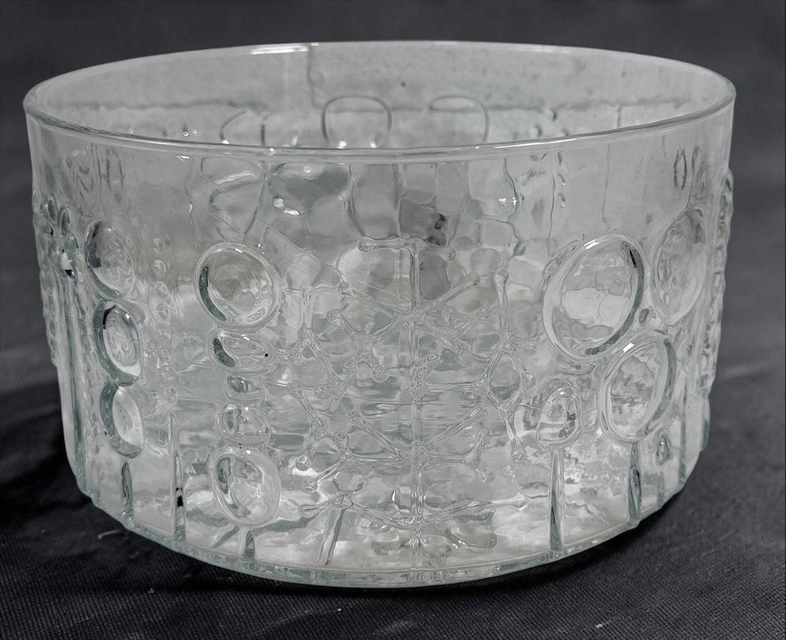 Vintage Iittala Flora centerpiece bowl designed by Oiva Toikka for Nuutajärvi, Finland. Large 9.5-inch clear pressed glass bowl with iconic botanical motifs from the 1960s.
