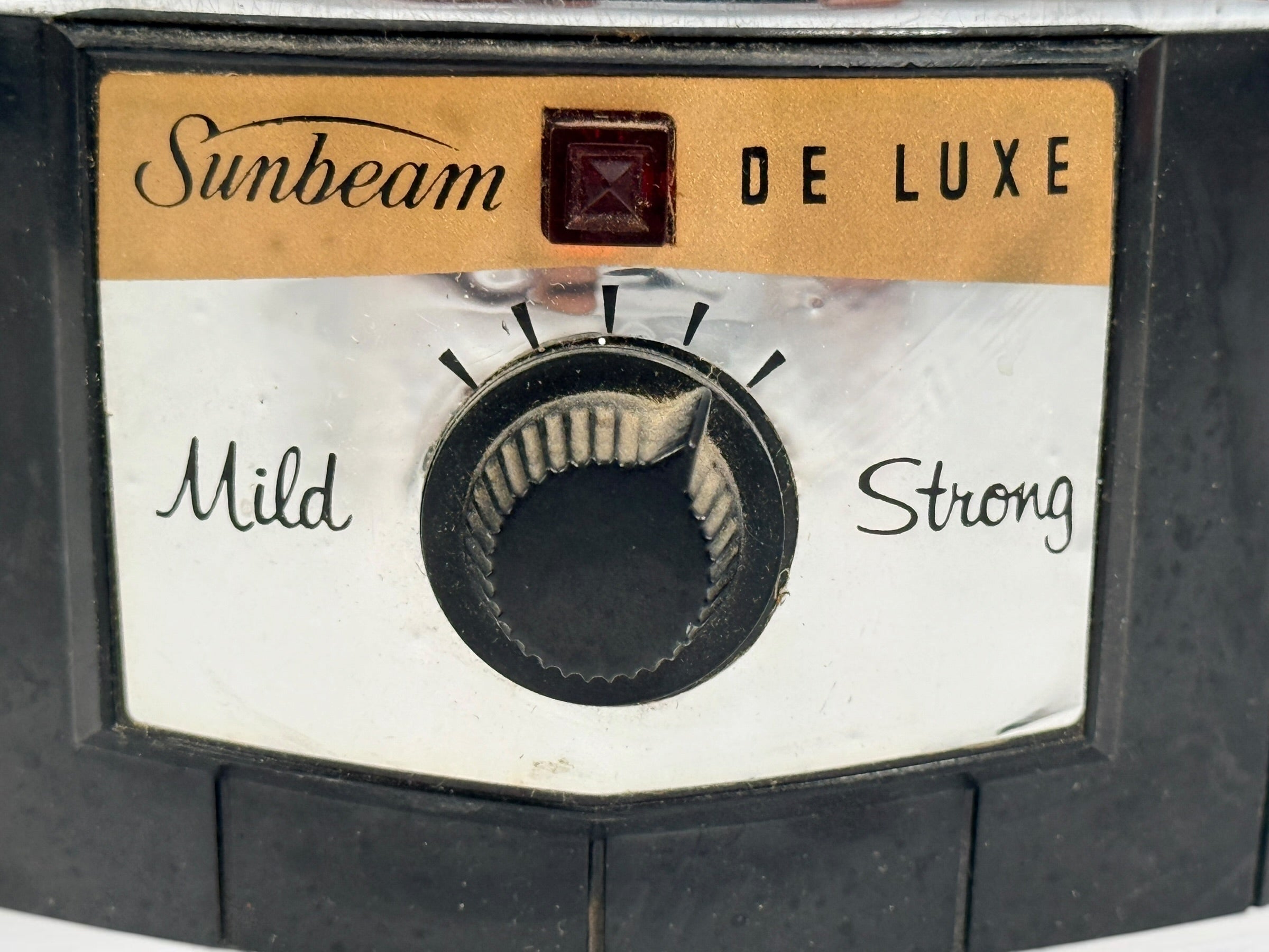 Vintage Sunbeam Coffeemaster Deluxe AP18 9-cup electric percolator made in Canada, featuring adjustable brew strength, a coffee-level gauge, and classic mid-century chrome styling.