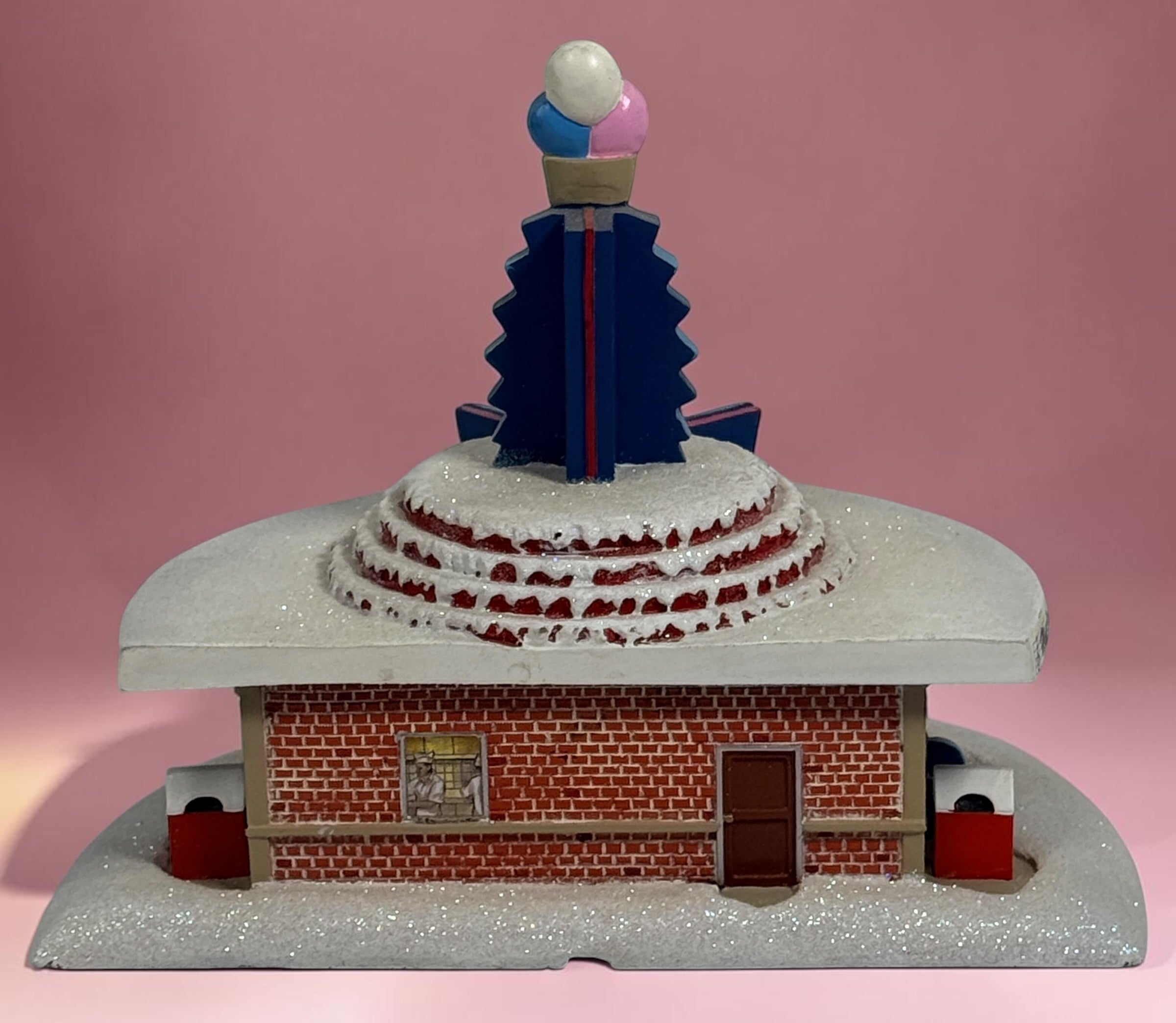 Official 2005 Hawthorne Village “All Shook Up” Soda Fountain from the Elvis Presley Rock ‘n’ Roll Holiday Village collection, featuring colorful retro diner details and snowy accents.