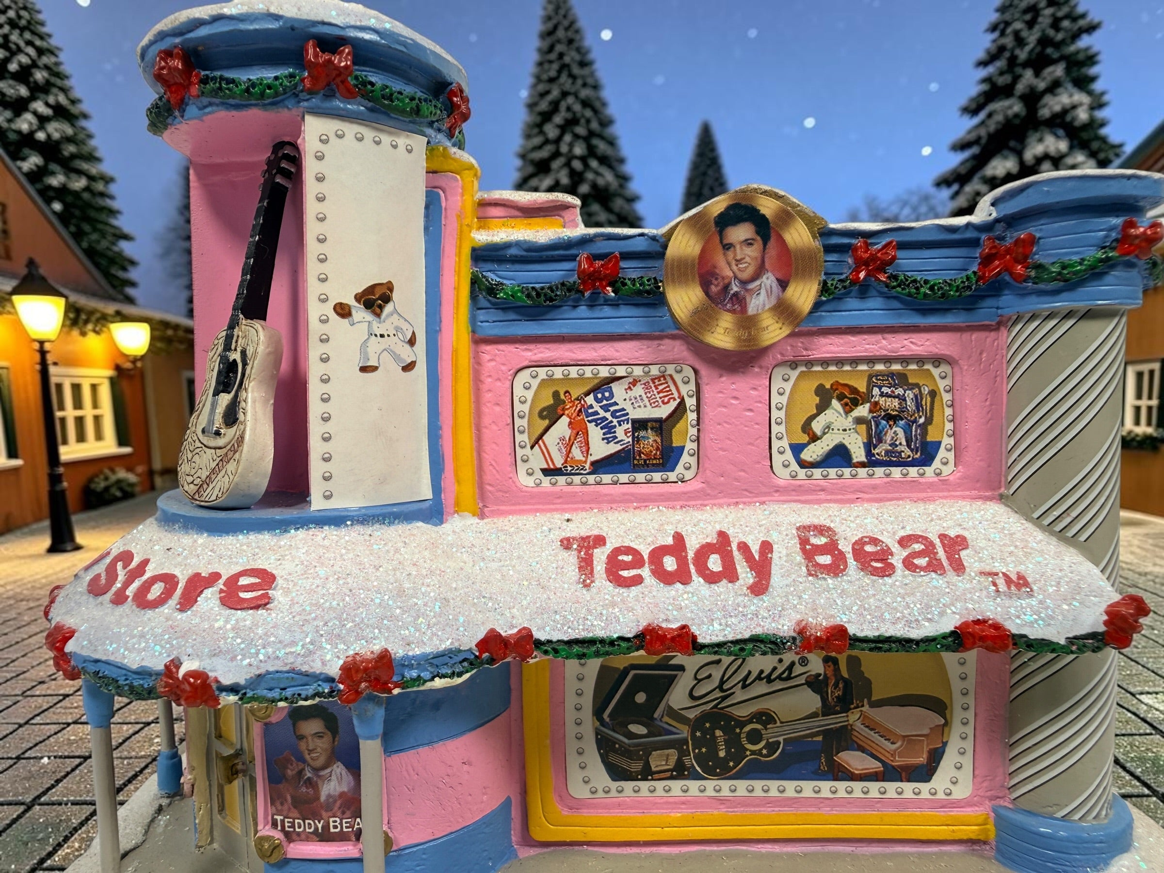 Hawthorne Village Elvis Presley Teddy Bear Toy Store from the 2006 Rock ’n’ Roll Holiday Village. Sculpture A0628. Untested, light cord missing.