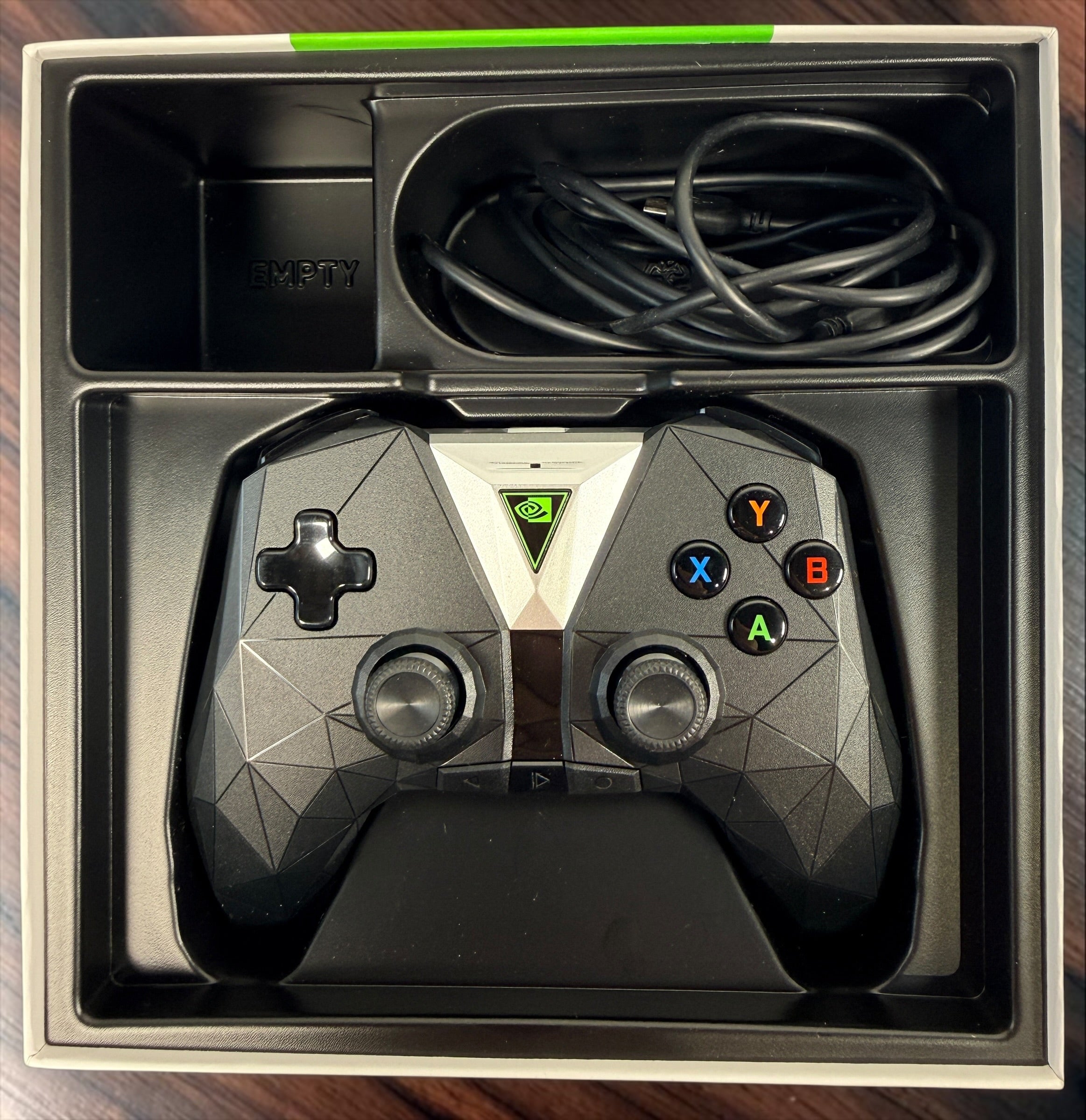 NVIDIA SHIELD P2920 wireless gaming controller with original NVIDIA box and charging cable. Untested and sold as-is.