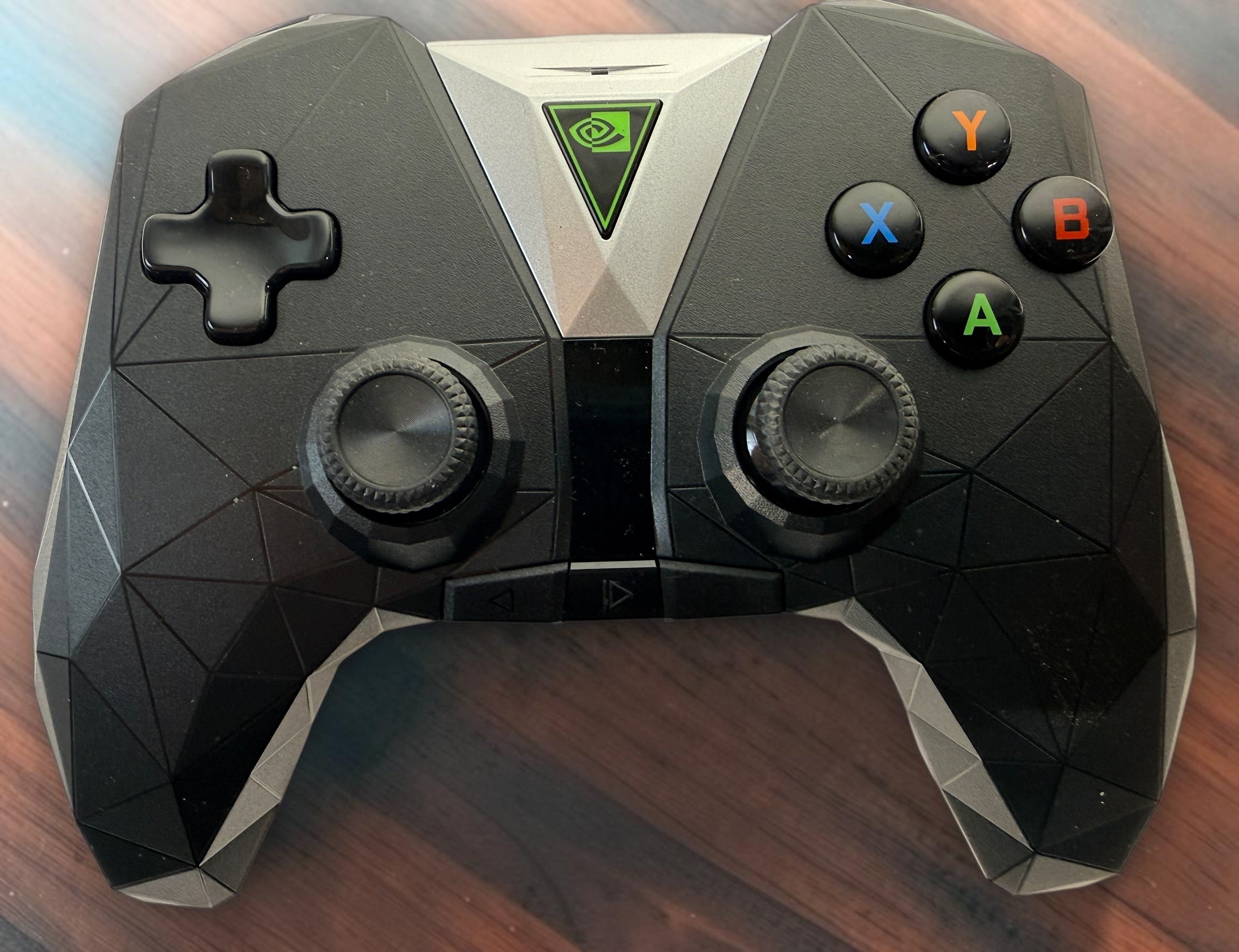 NVIDIA SHIELD P2920 wireless gaming controller with original NVIDIA box and charging cable. Untested and sold as-is.