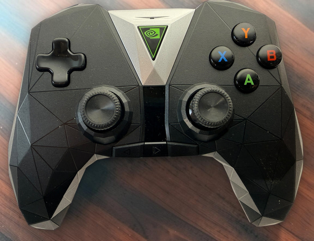 NVIDIA SHIELD P2920 wireless gaming controller with original NVIDIA box and charging cable. Untested and sold as-is.