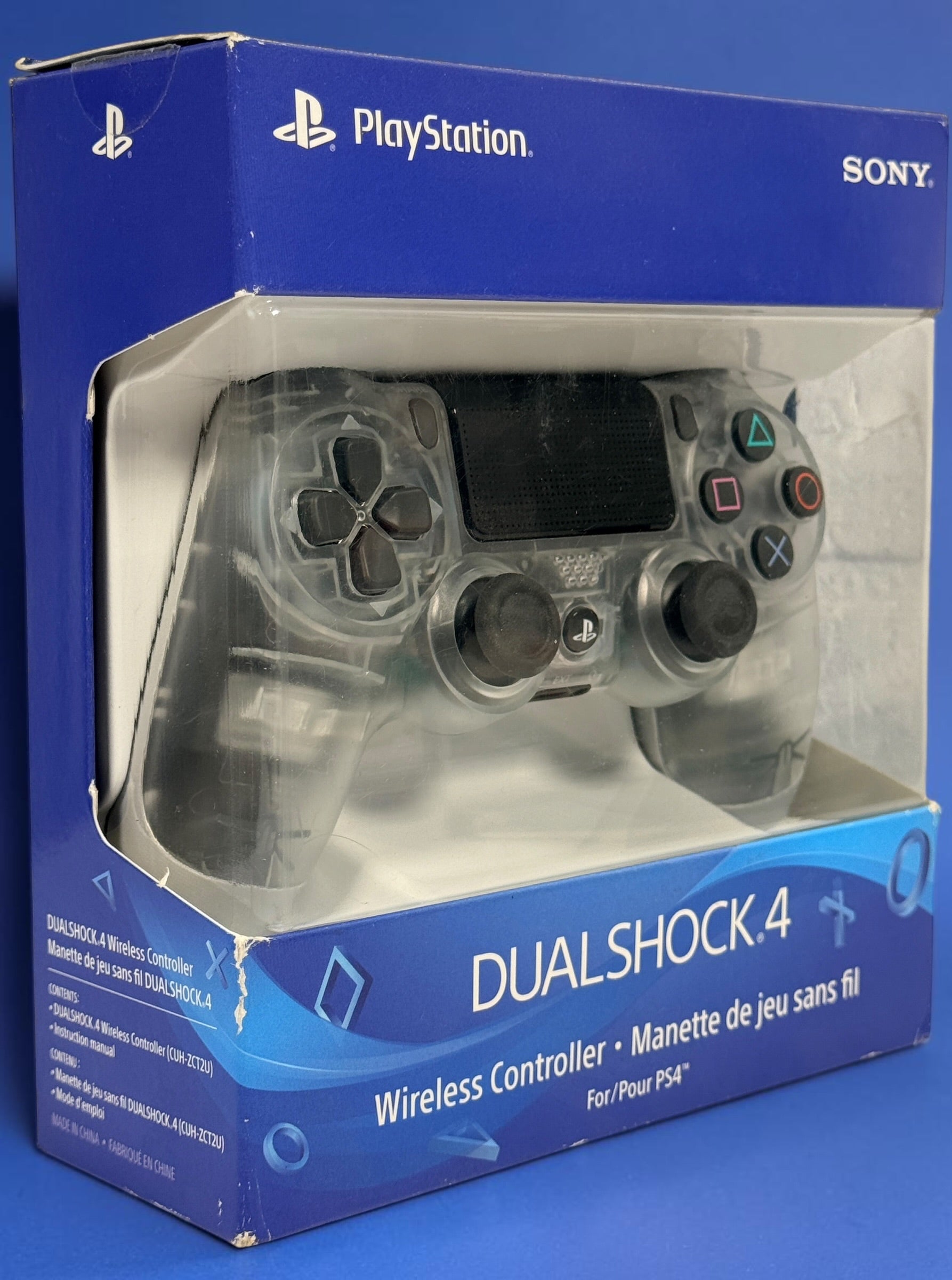 Sony DualShock 4 V2 Crystal PS4 wireless controller CUH-ZCT2U with original box. Genuine transparent Sony PlayStation controller.