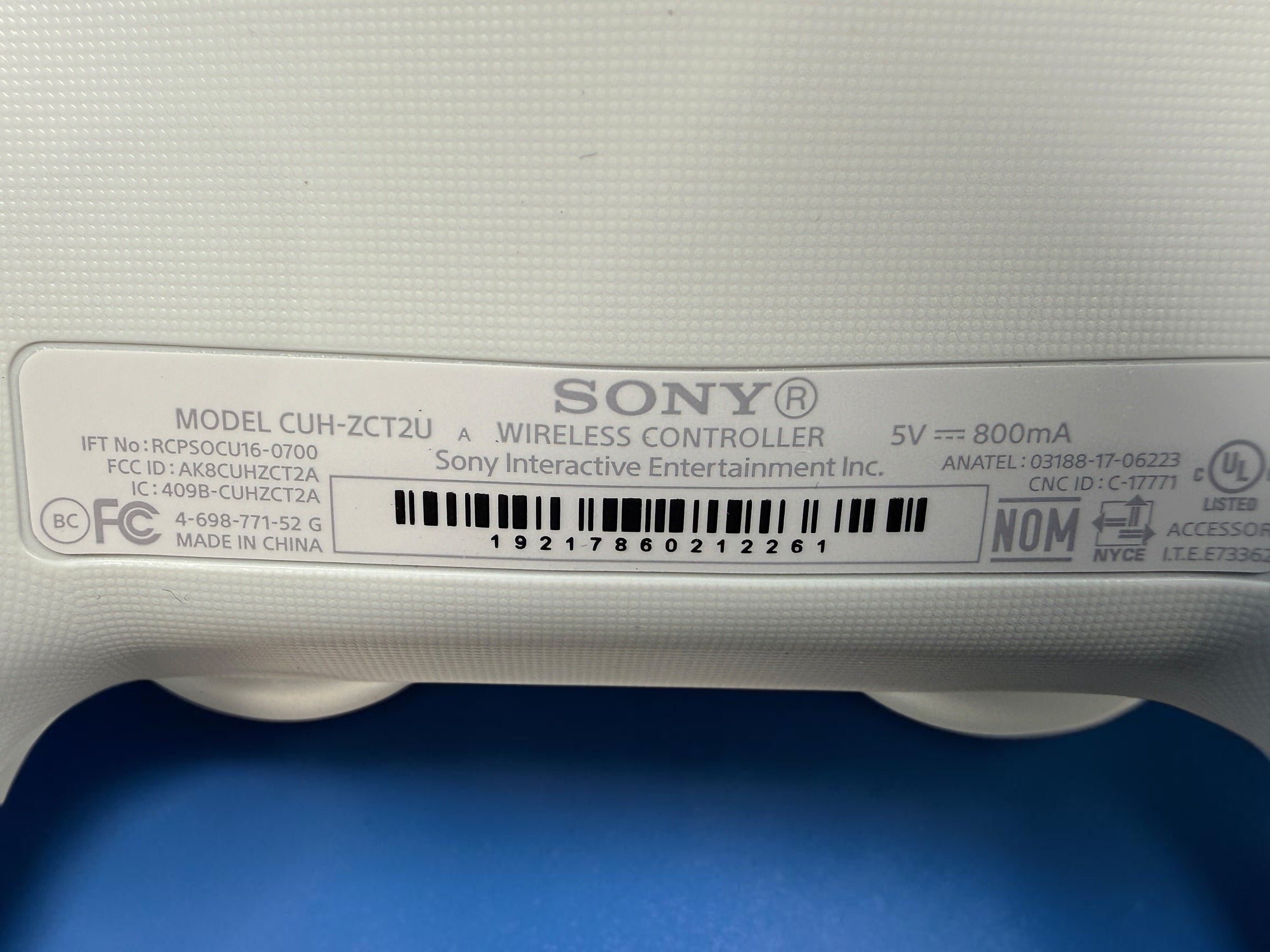 Sony DualShock 4 V2 Crystal PS4 wireless controller CUH-ZCT2U with original box. Genuine transparent Sony PlayStation controller.
