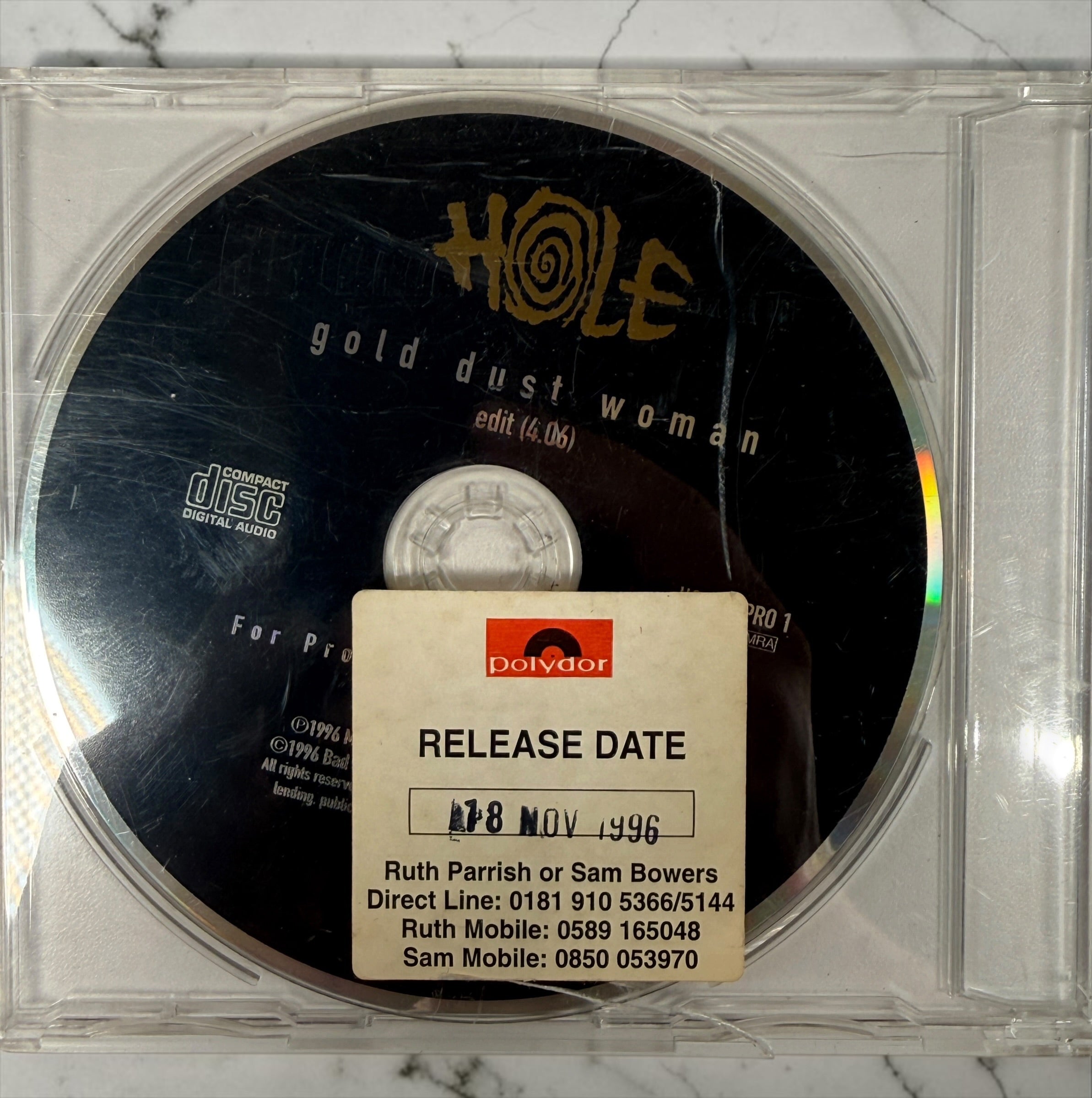 Rare 1996 Hole Gold Dust Woman UK promotional CD, HOLECDPRO 1, with original Polydor 18 Nov 1996 release-date sticker. Collector promo.