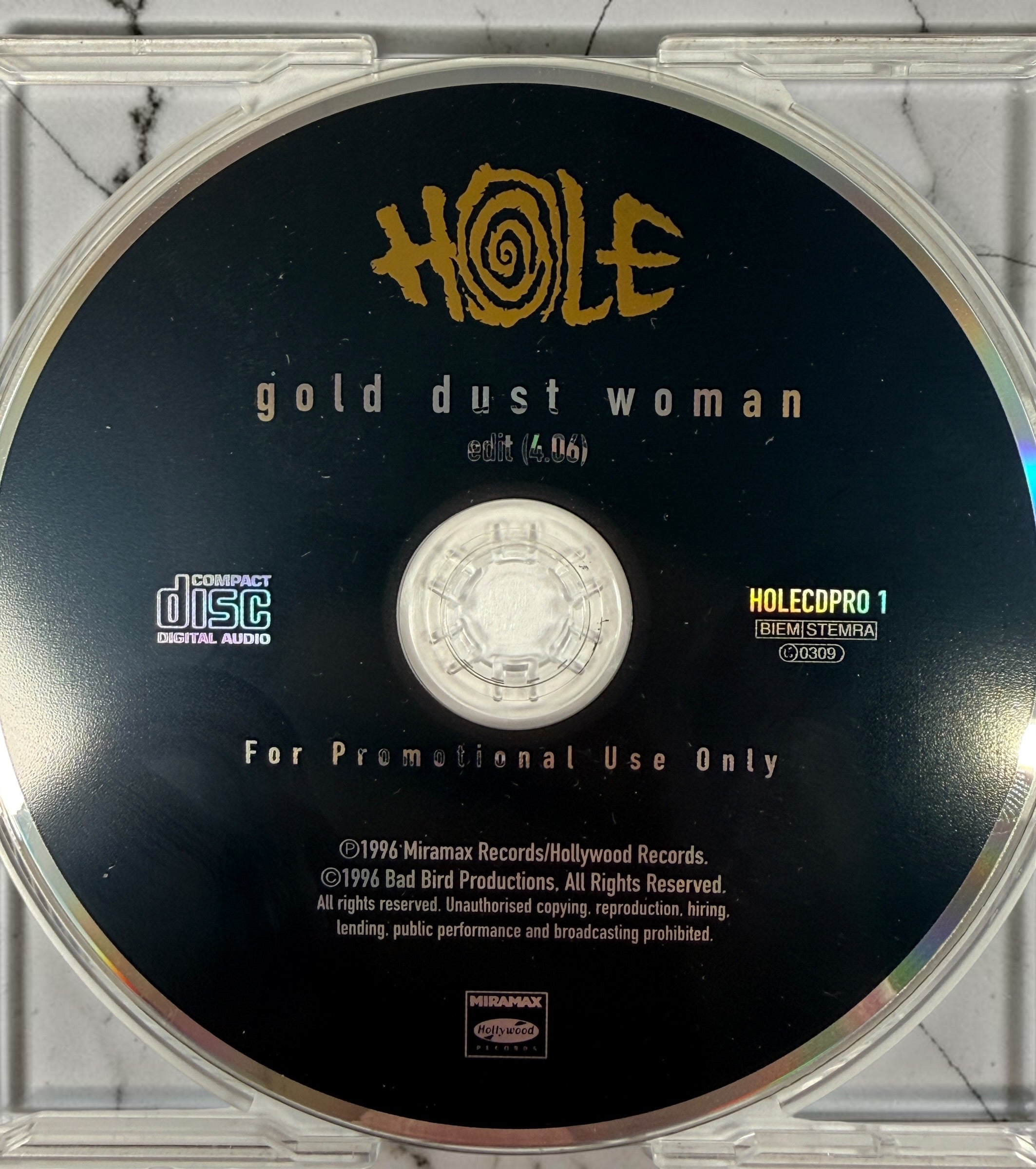 Rare 1996 Hole Gold Dust Woman UK promotional CD, HOLECDPRO 1, with original Polydor 18 Nov 1996 release-date sticker. Collector promo.