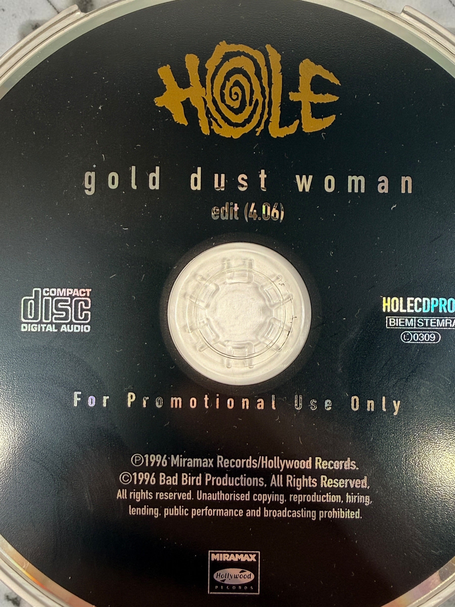 Rare 1996 Hole Gold Dust Woman UK promotional CD, HOLECDPRO 1, with original Polydor 18 Nov 1996 release-date sticker. Collector promo.