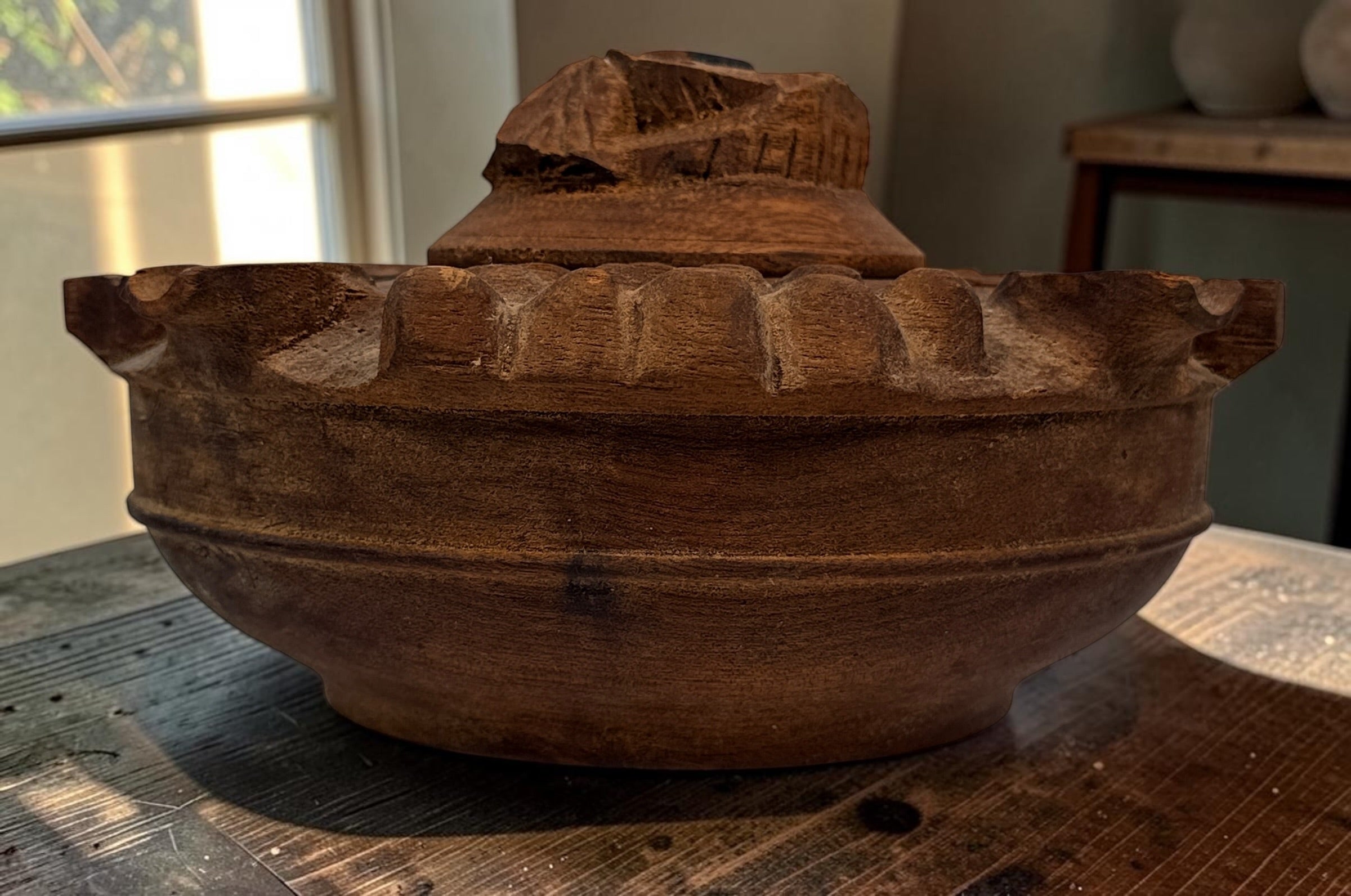 Vintage Savoyard wooden grolle with 4 drinking spouts, carved grapes and vine leaves. Traditional French Alpine communal coffee vessel and folk art.