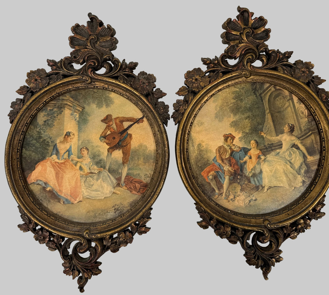 Vintage Durwood gilt wall plaques pair with Rococo frames and romantic pastoral scenes. Authentic 1970s decorative wall art, sold as a matching set.