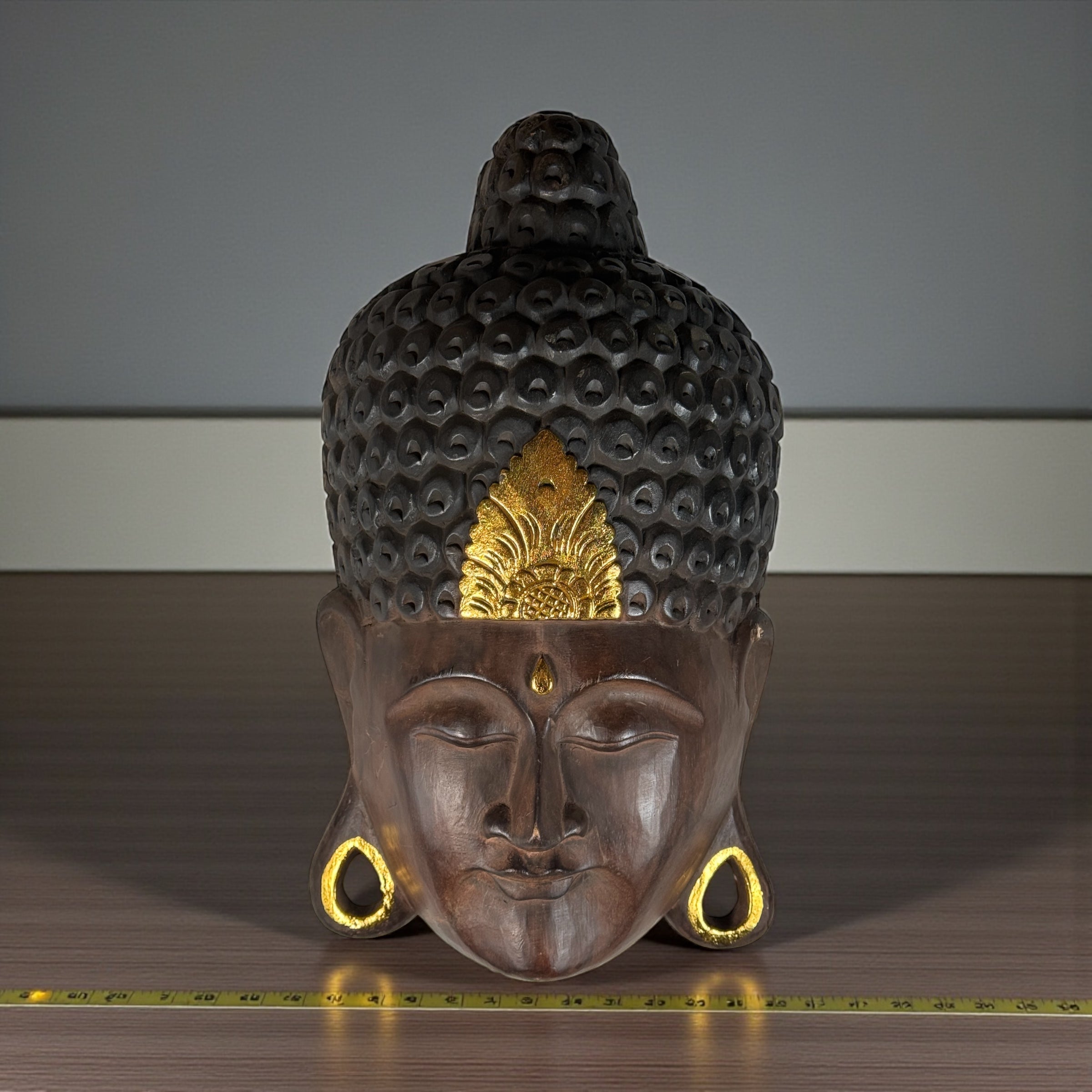 Large hand-carved wooden Buddha wall mask with gold accents, 20 inches tall. Southeast Asian decorative carving, hollow-back wall mount.