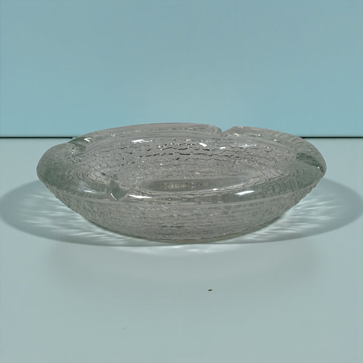 Vintage Iittala Ultima Thule glass ashtray by Tapio Wirkkala, 8 inch diameter. Iconic Finnish modernist pressed glass design.