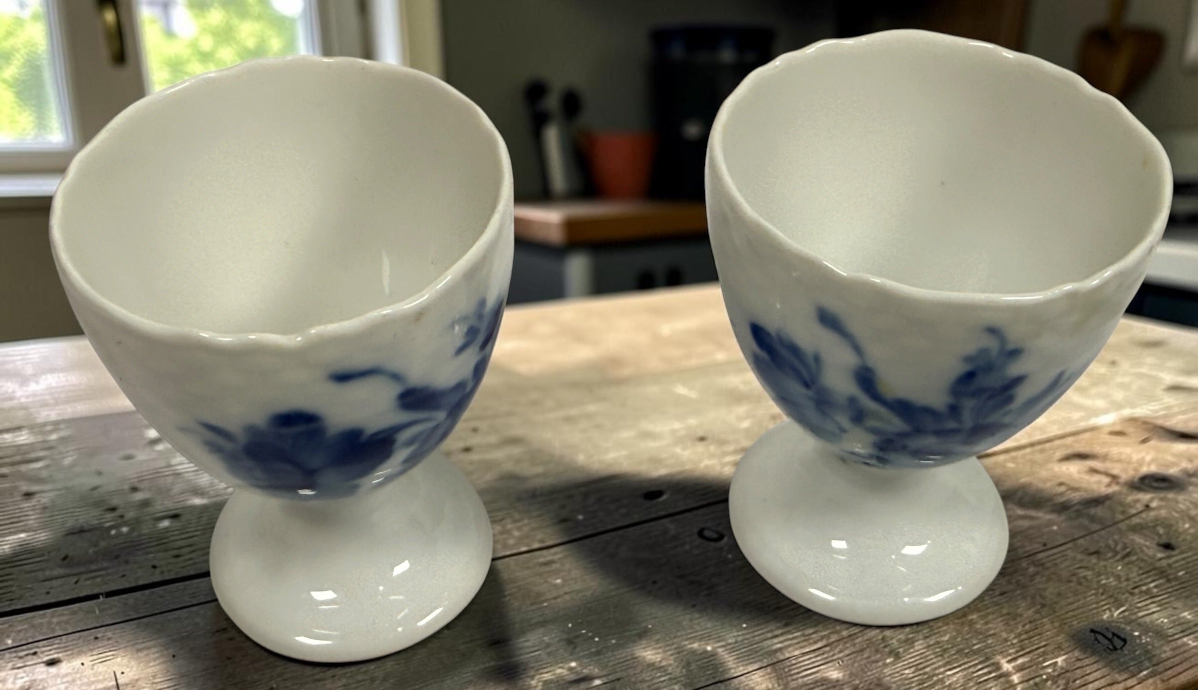 Vintage Royal Copenhagen Blue Flower 10/1568 porcelain egg cups, matching pair with hand-painted cobalt floral decoration, made in Denmark.