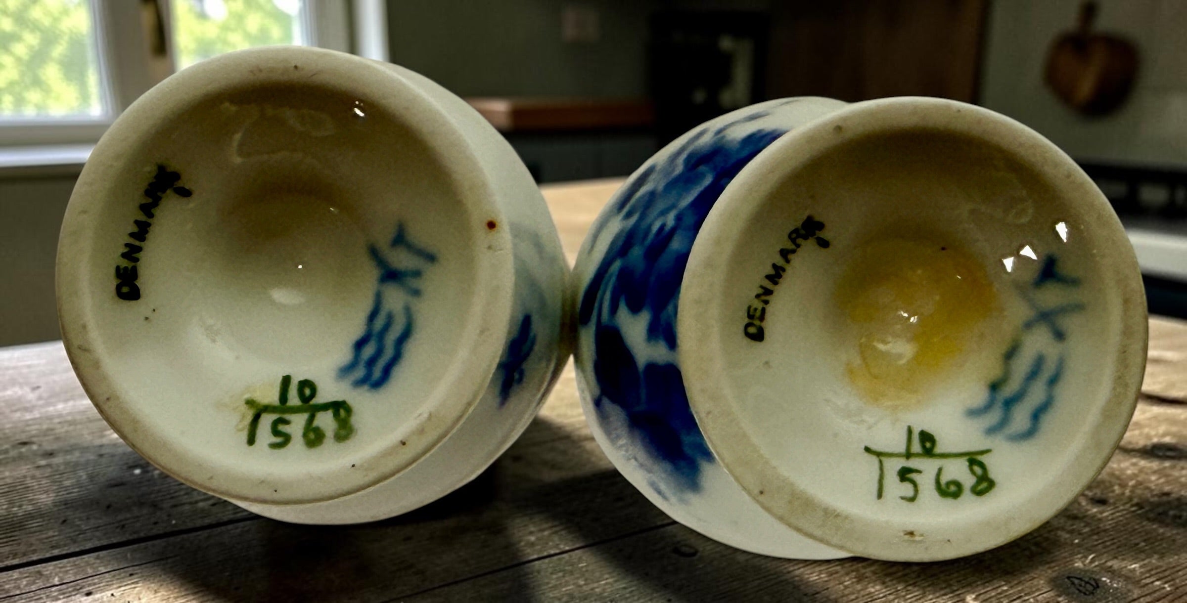Vintage Royal Copenhagen Blue Flower 10/1568 porcelain egg cups, matching pair with hand-painted cobalt floral decoration, made in Denmark.