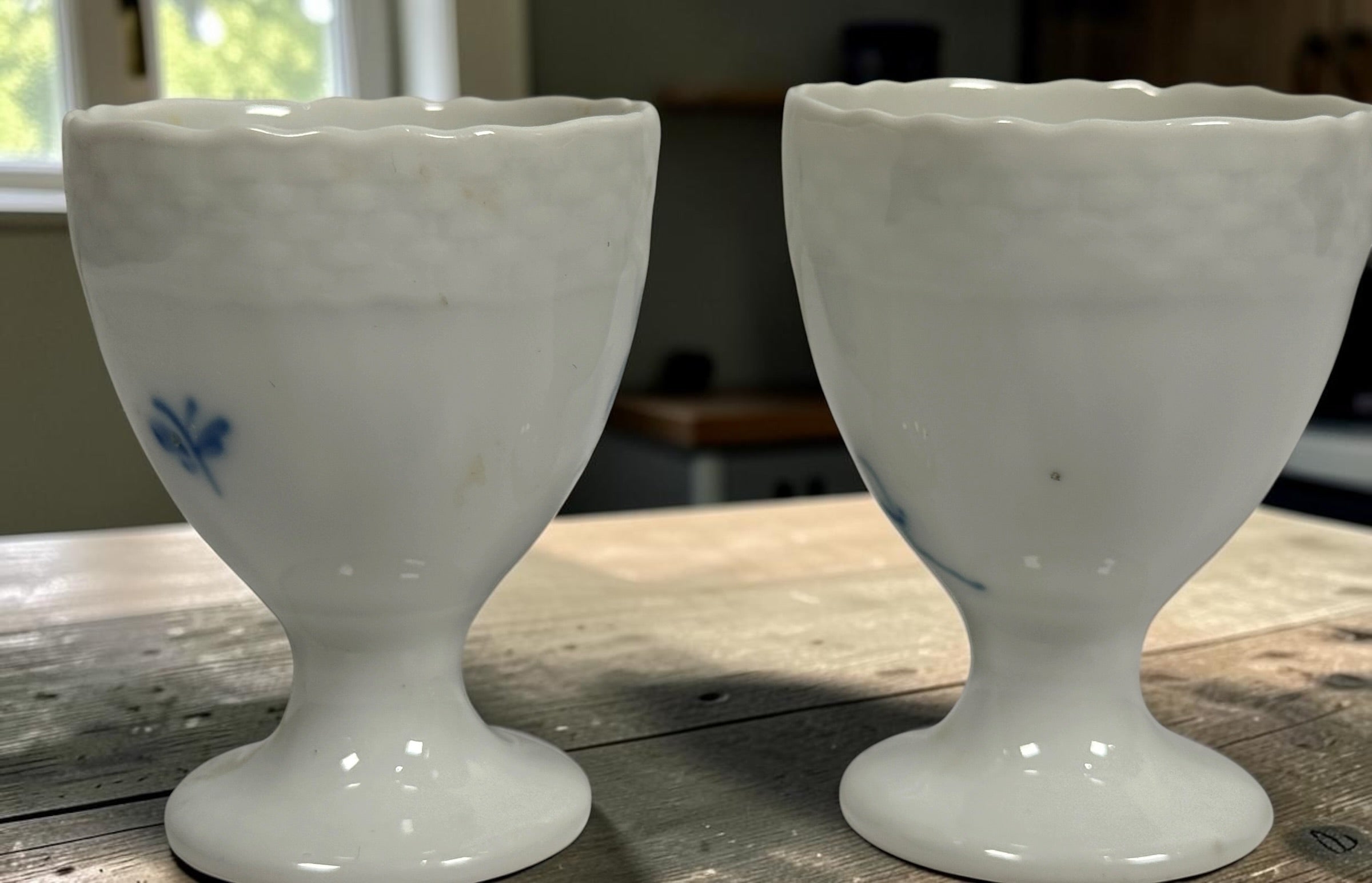 Vintage Royal Copenhagen Blue Flower 10/1568 porcelain egg cups, matching pair with hand-painted cobalt floral decoration, made in Denmark.