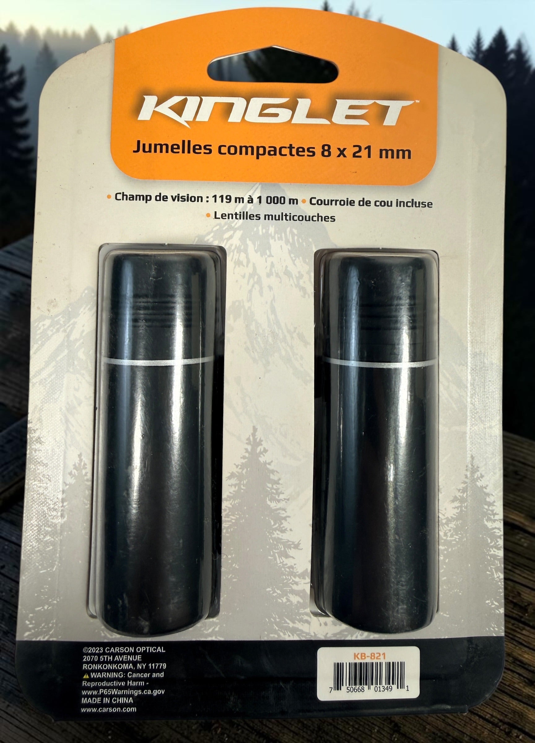 Carson Kinglet KB-821 8x21 compact binoculars with multi-coated lenses and neck strap. New and factory sealed in original packaging.