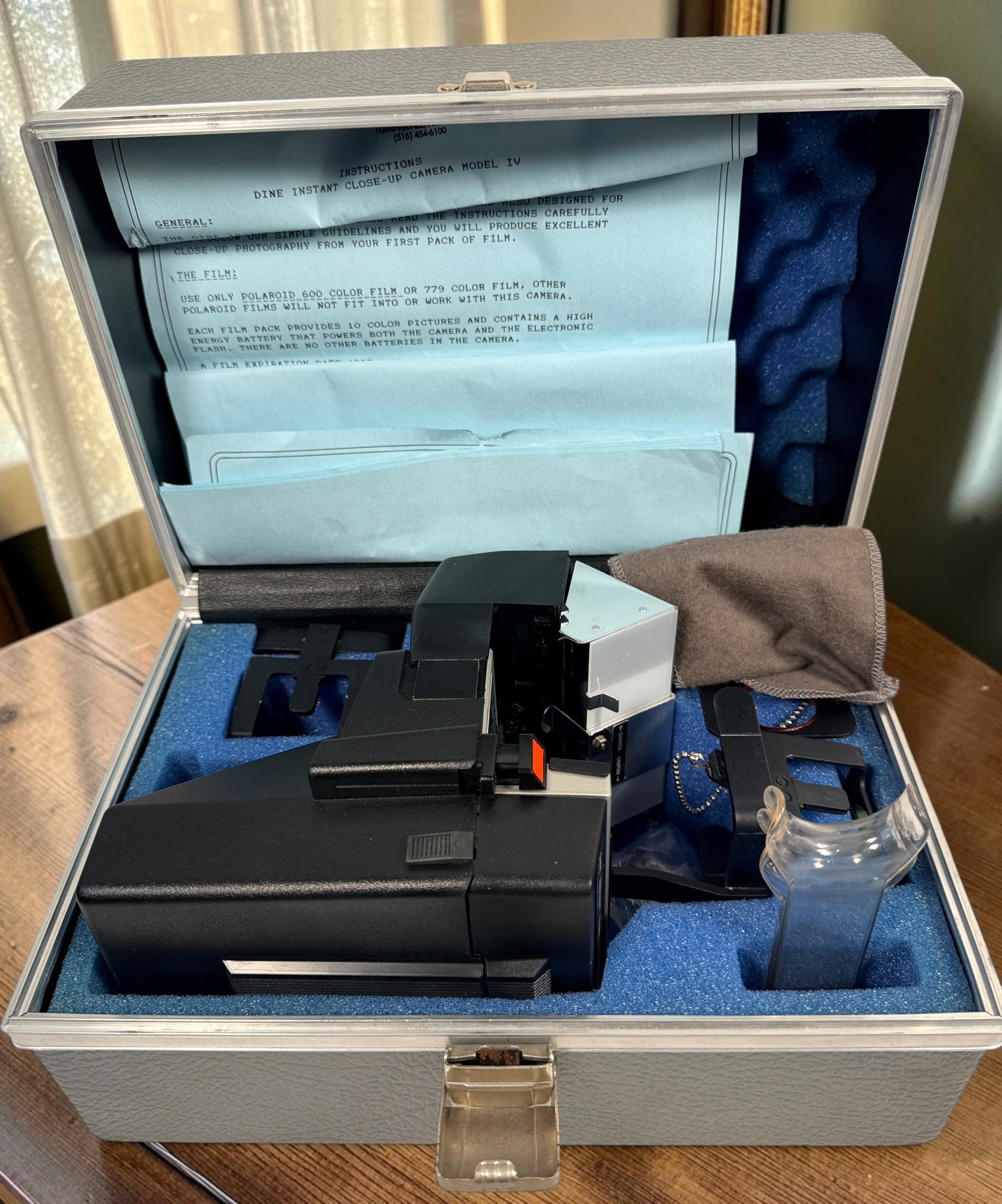 Vintage Lester A. Dine Model IV Polaroid dental close-up camera with case, 3 lenses, accessories and instructions. Untested and sold as-is.