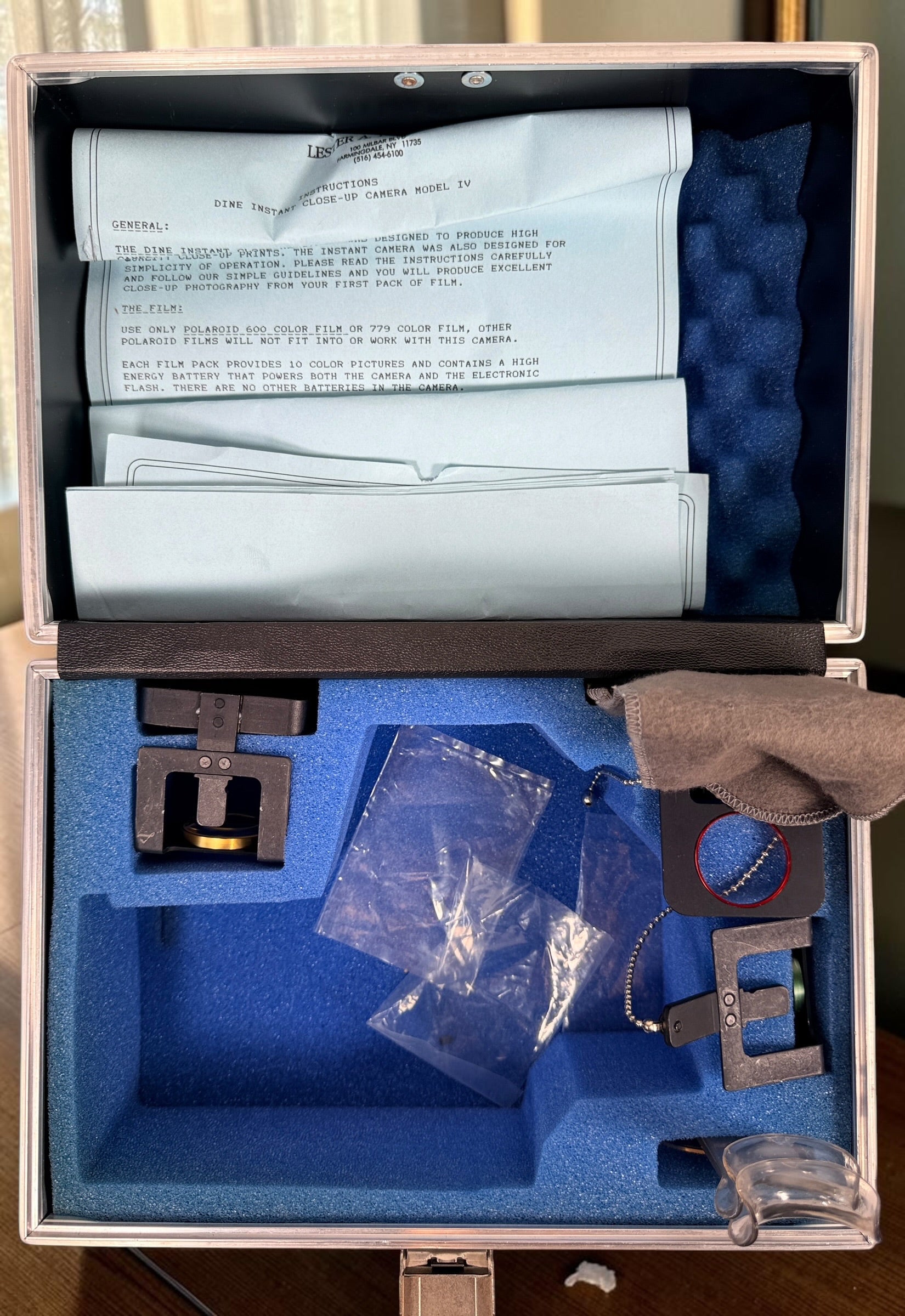 Vintage Lester A. Dine Model IV Polaroid dental close-up camera with case, 3 lenses, accessories and instructions. Untested and sold as-is.