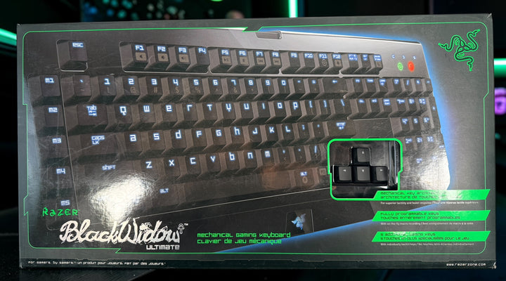 Razer BlackWidow Ultimate mechanical gaming keyboard with backlit keys, macro controls and original box. Early-generation Razer PC gaming keyboard