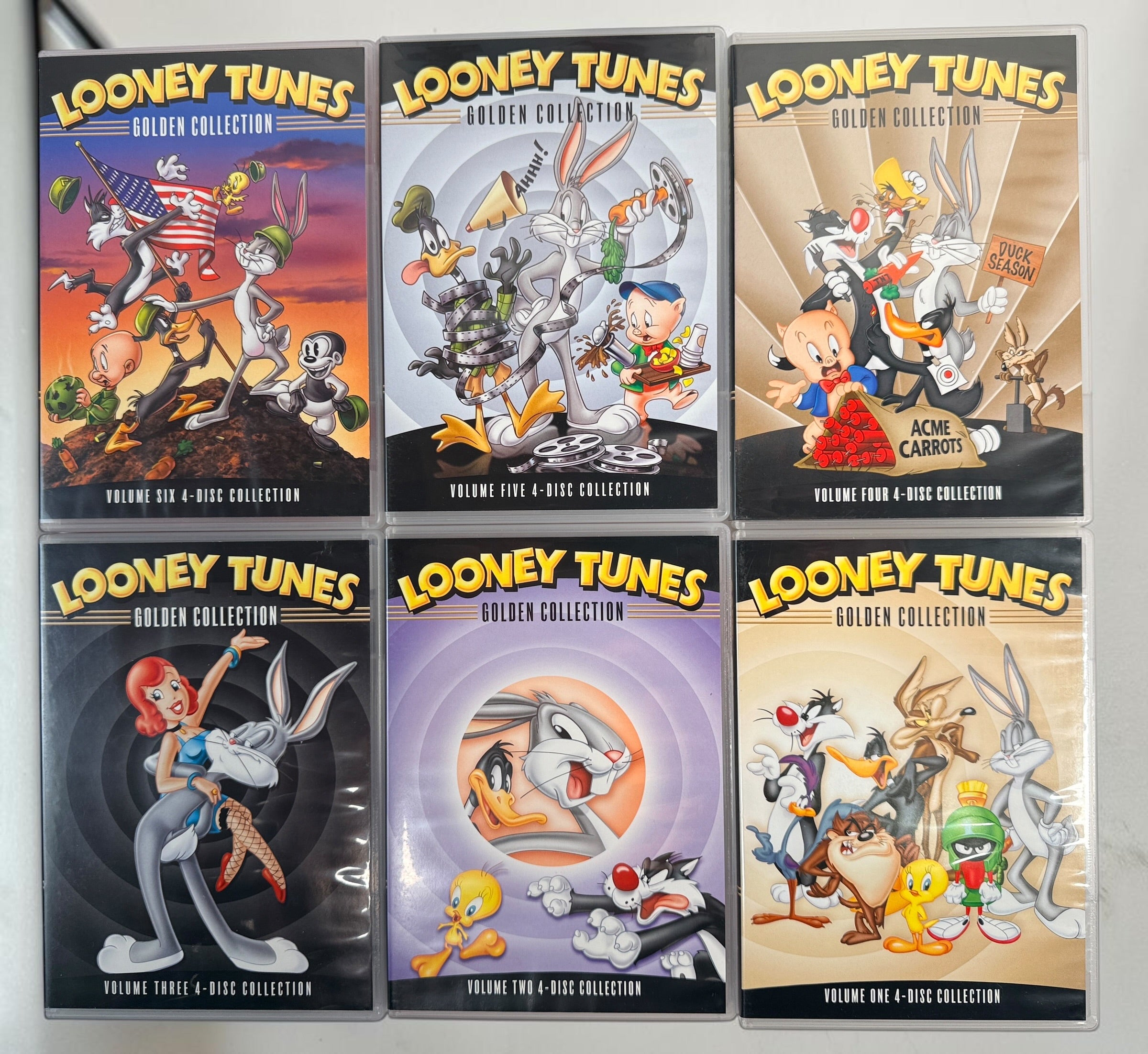 Looney Tunes Golden Collection Volumes 1–6 complete 24-disc DVD box set with 356 classic Warner Bros. cartoons and original collector’s box.