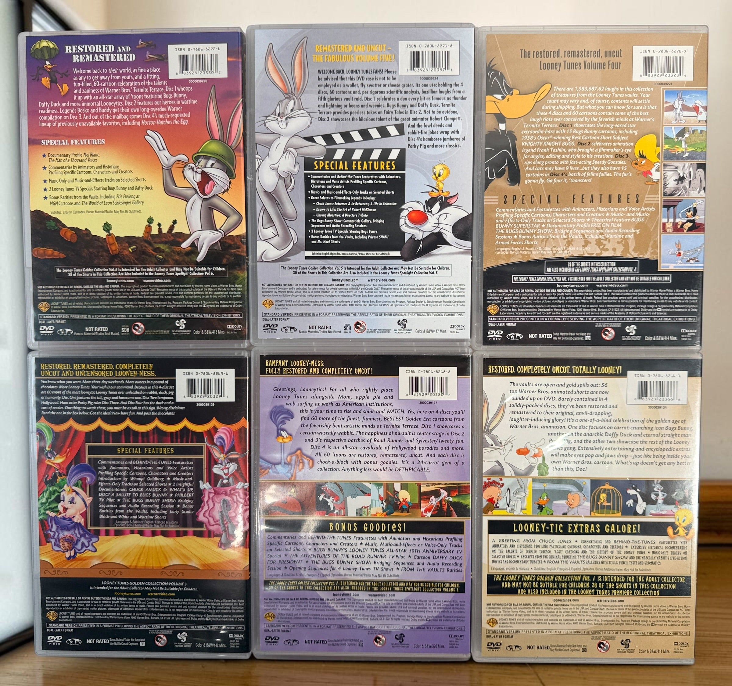 Looney Tunes Golden Collection Volumes 1–6 complete 24-disc DVD box set with 356 classic Warner Bros. cartoons and original collector’s box.