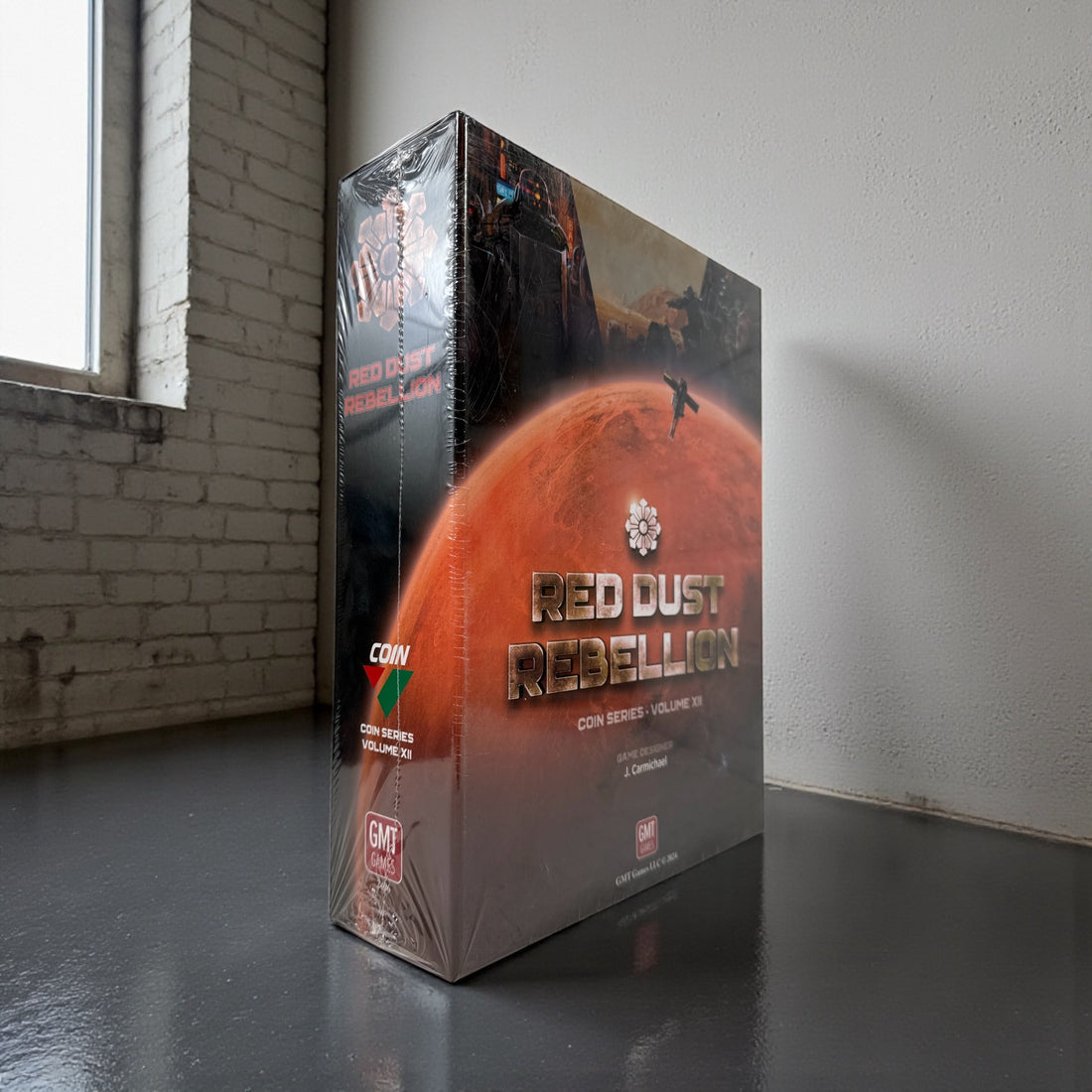 Sealed copy of Red Dust Rebellion, COIN Series Volume XII by GMT Games. Deep sci-fi strategy board game set on Mars. New in shrink.