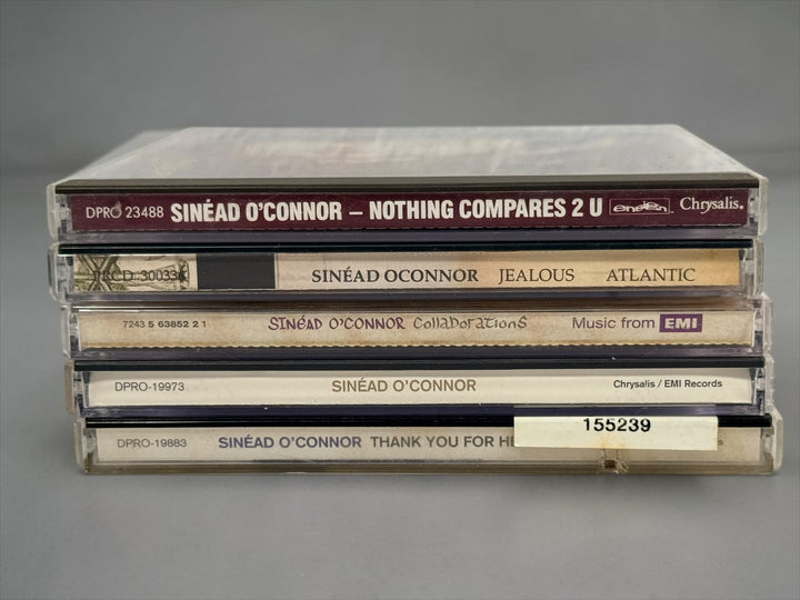 Collectible Sinéad O’Connor 5-CD lot featuring rare U.S. promotional releases, Nothing Compares 2 U, Jealous and Thank You for Hearing Me.