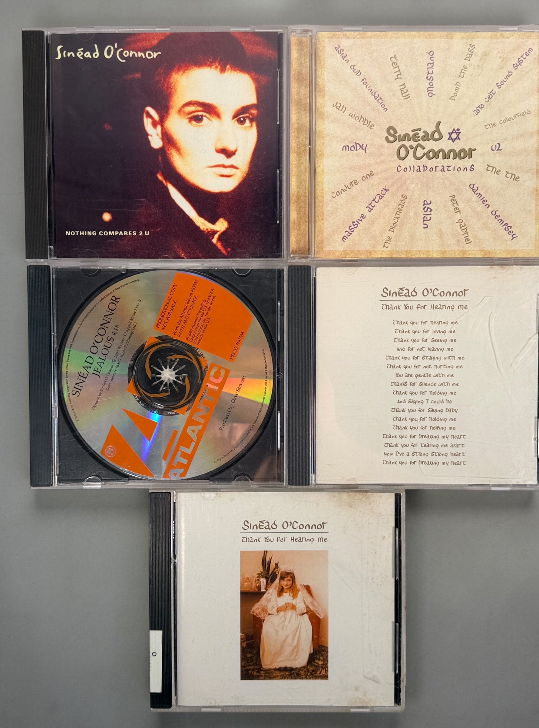 Collectible Sinéad O’Connor 5-CD lot featuring rare U.S. promotional releases, Nothing Compares 2 U, Jealous and Thank You for Hearing Me.