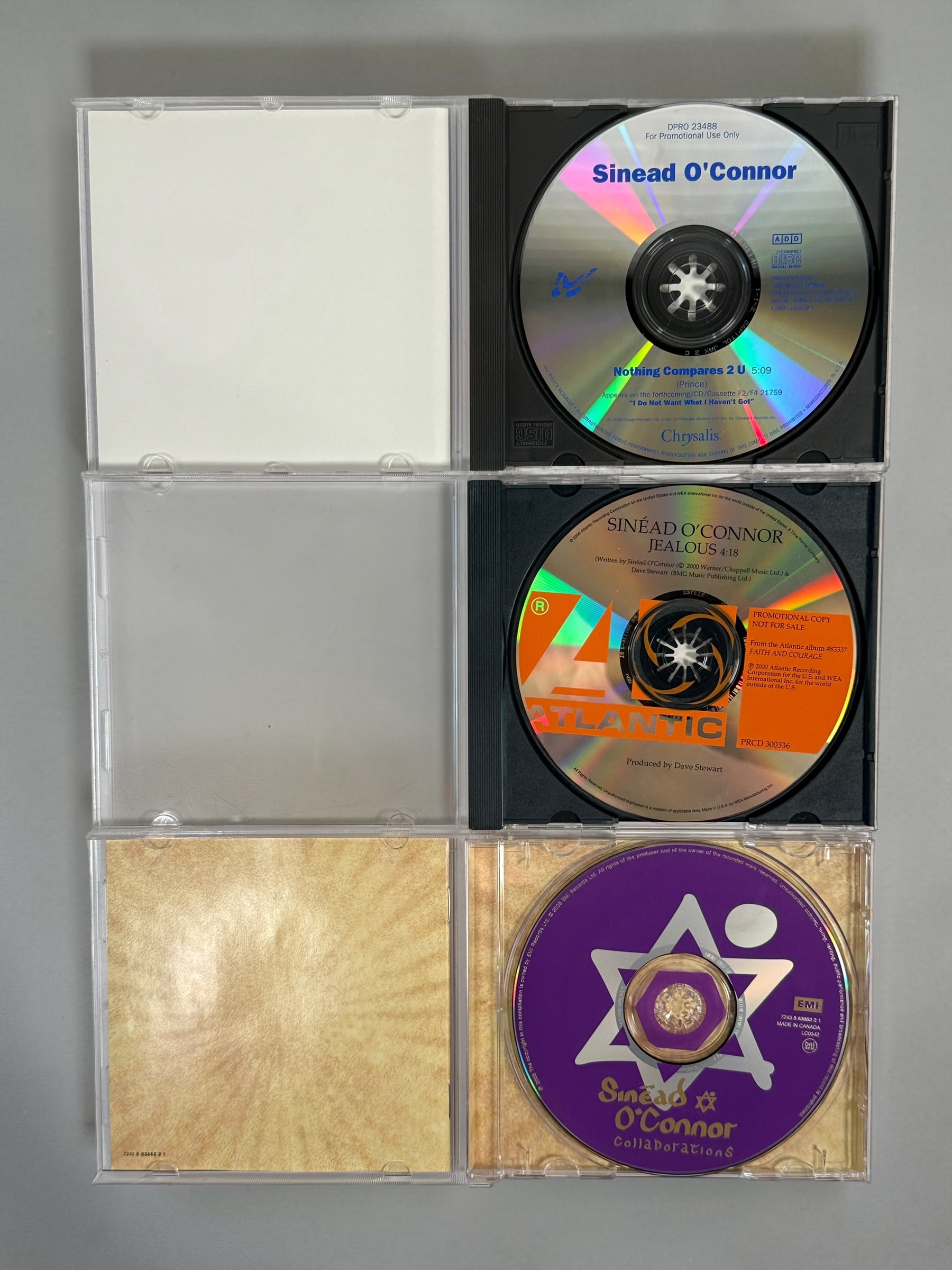 Collectible Sinéad O’Connor 5-CD lot featuring rare U.S. promotional releases, Nothing Compares 2 U, Jealous and Thank You for Hearing Me.