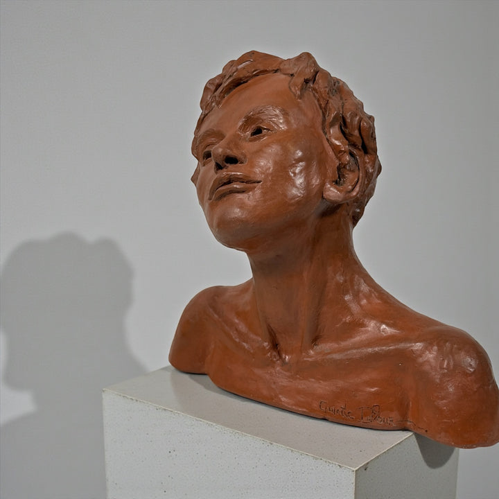 Original terracotta bust sculpture Moments de grâce by Ginette Dufour. Canadian contemporary figurative art with expressive detail and gallery presence.