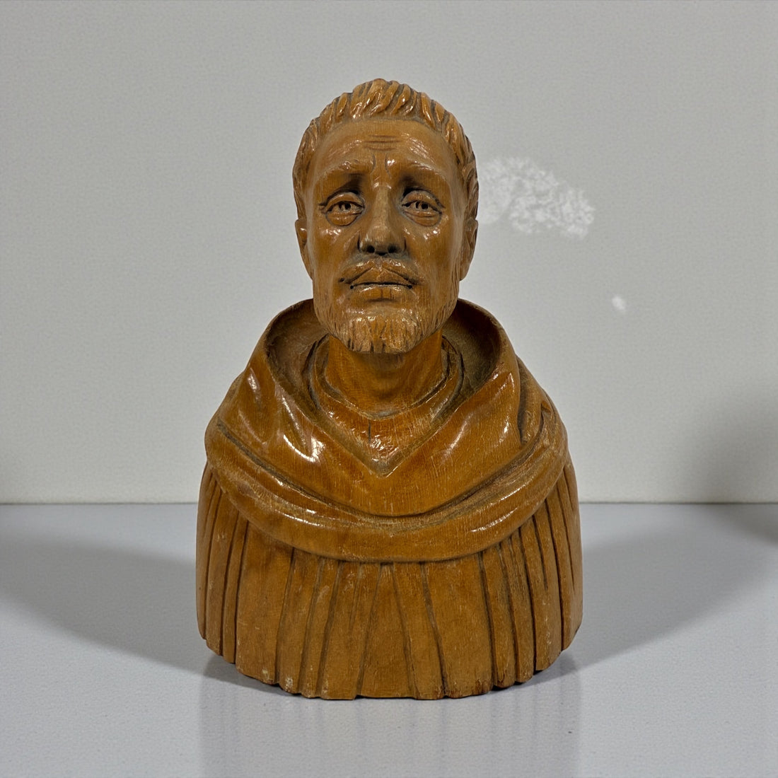 Hand-carved mid-century wood monk bust. Vintage religious décor from Europe. Warm handcrafted detail. Ideal for collectors and spiritual home staging.