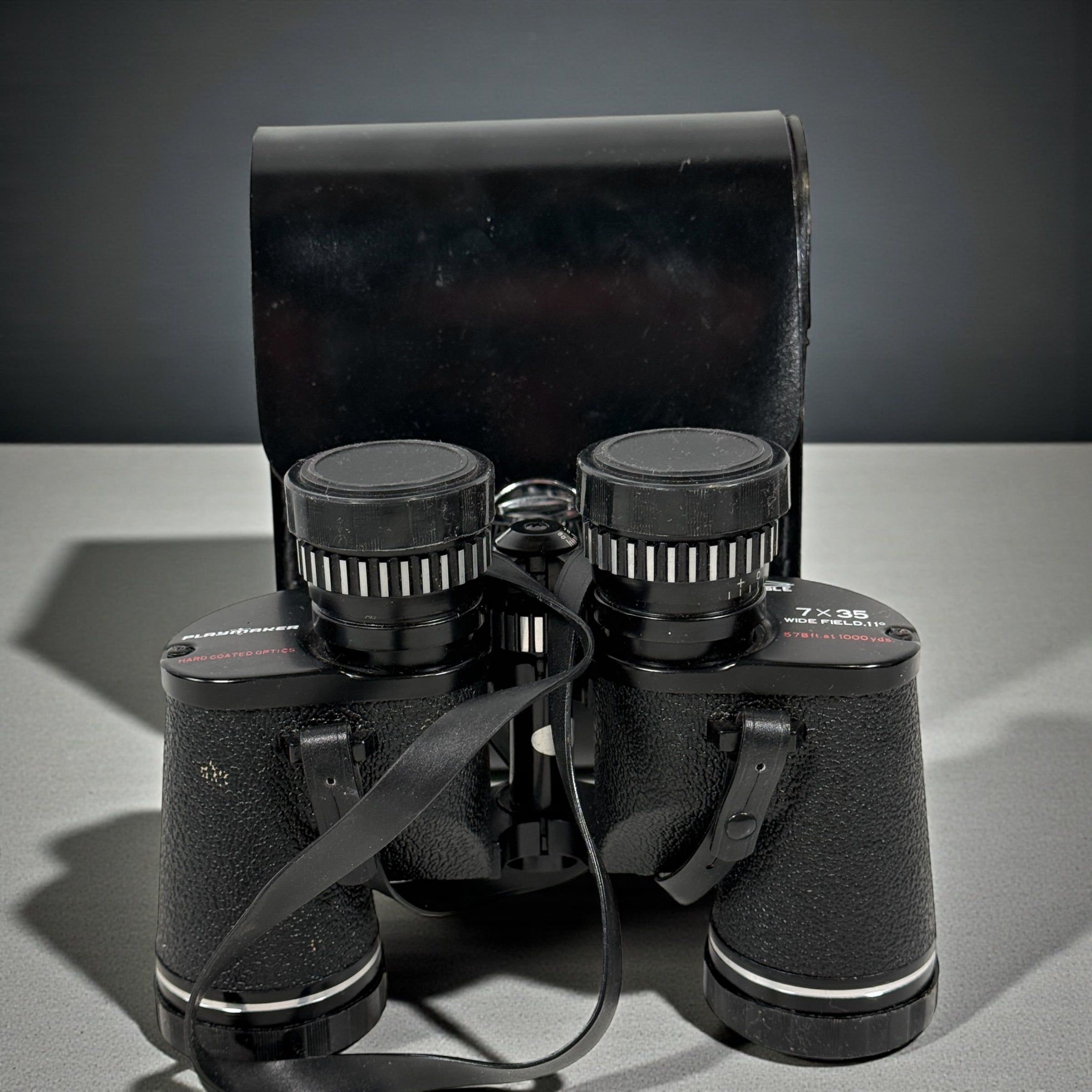 Vintage 7×35 wide-angle binoculars with case and caps. Clean optics, Japan made, 11-degree field. Ideal for birding, camping, cottage use. Complete and functional.