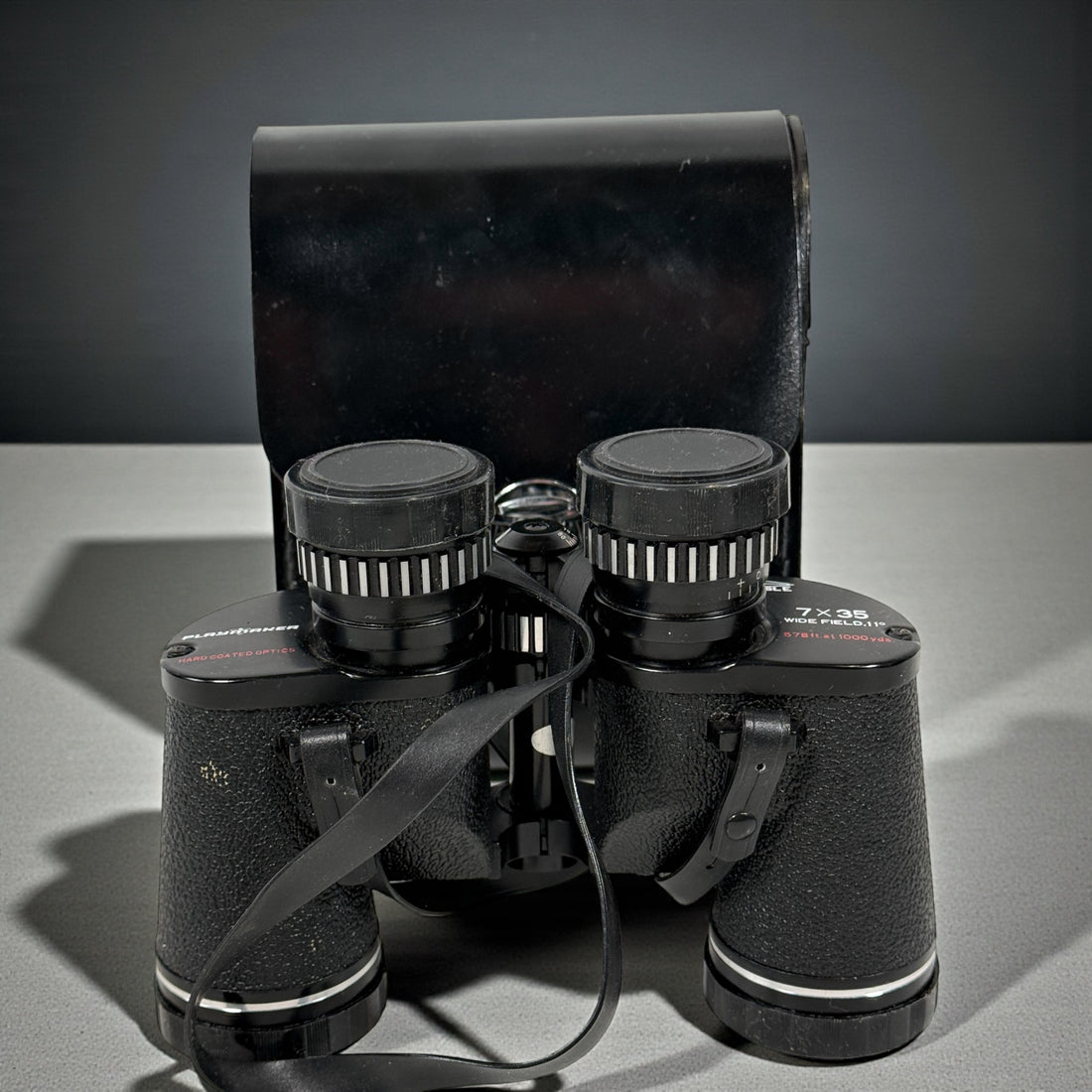 Vintage 7×35 wide-angle binoculars with case and caps. Clean optics, Japan made, 11-degree field. Ideal for birding, camping, cottage use. Complete and functional.