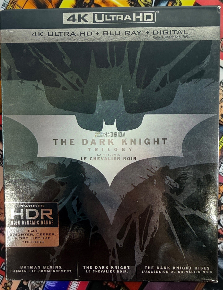The Dark Knight Trilogy 4K UHD + Blu-ray box set with Batman Begins, The Dark Knight and Dark Knight Rises. Canadian bilingual edition.