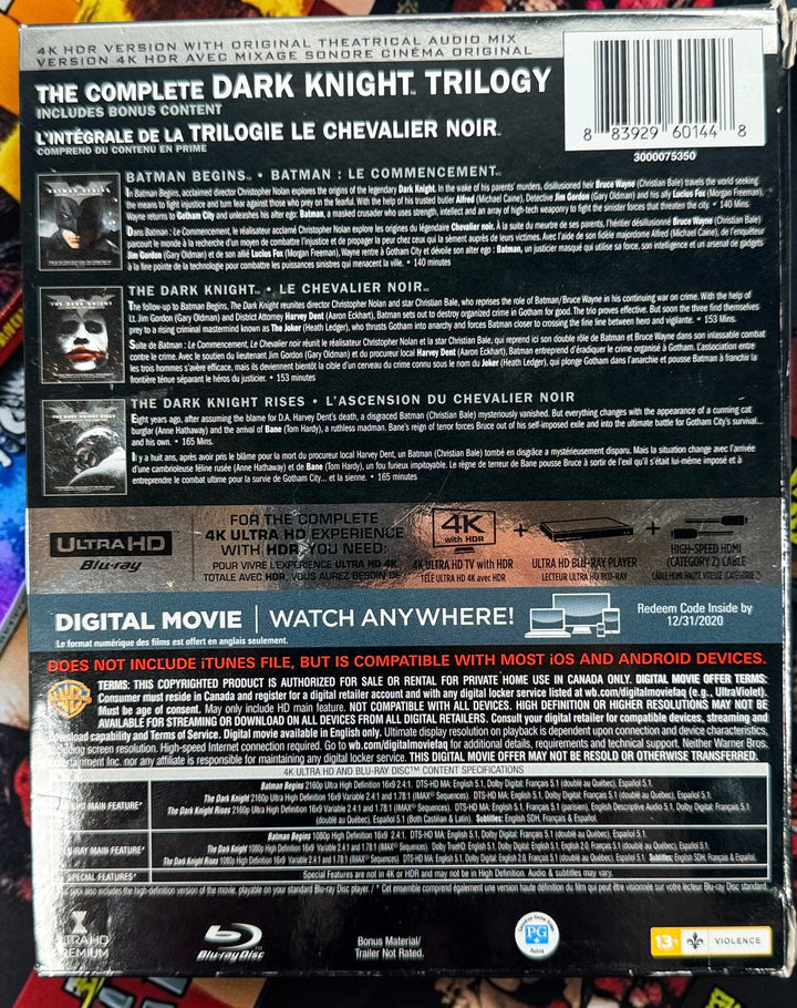 The Dark Knight Trilogy 4K UHD + Blu-ray box set with Batman Begins, The Dark Knight and Dark Knight Rises. Canadian bilingual edition.