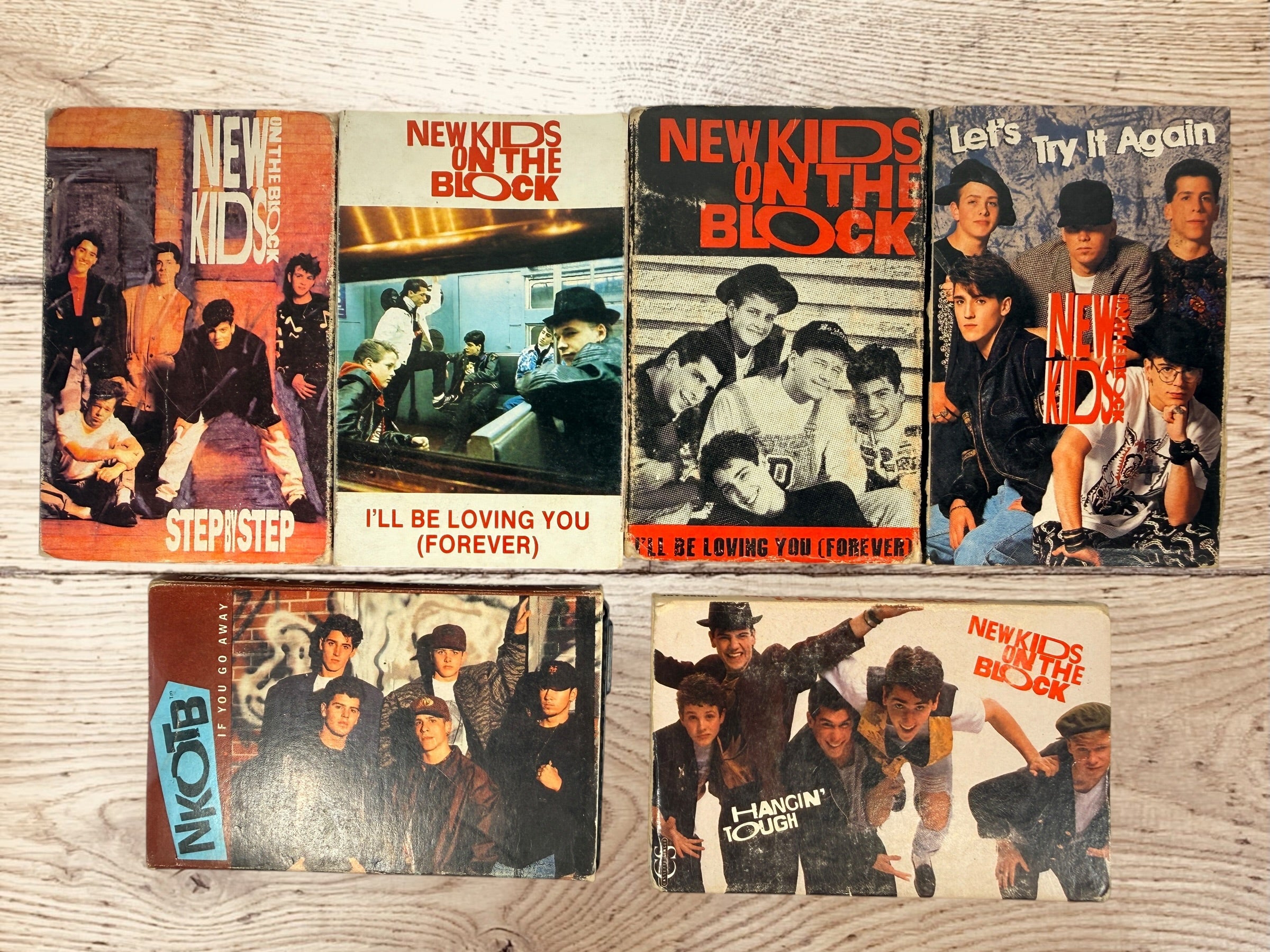 Vintage New Kids on the Block NKOTB lot of 6 Columbia cassette singles from 1988–1992, including Step By Step, Hangin’ Tough and more.