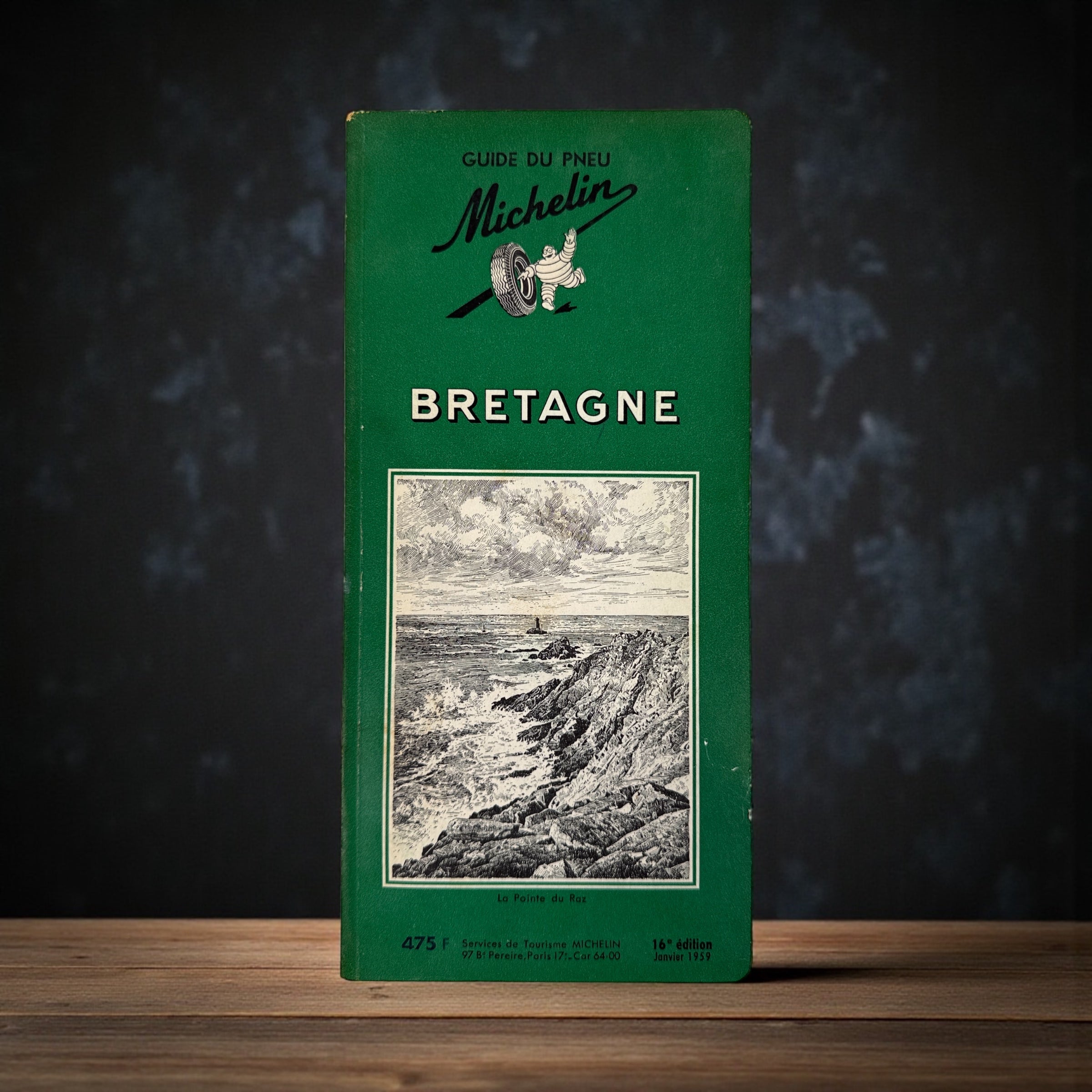 Vintage 1959 Michelin Bretagne Guide Vert, 16th edition with classic Bibendum cover and engravings. Collectible French motoring guide in good condition.