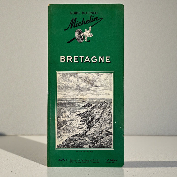 Vintage 1959 Michelin Bretagne Guide Vert, 16th edition with classic Bibendum cover and engravings. Collectible French motoring guide in good condition.